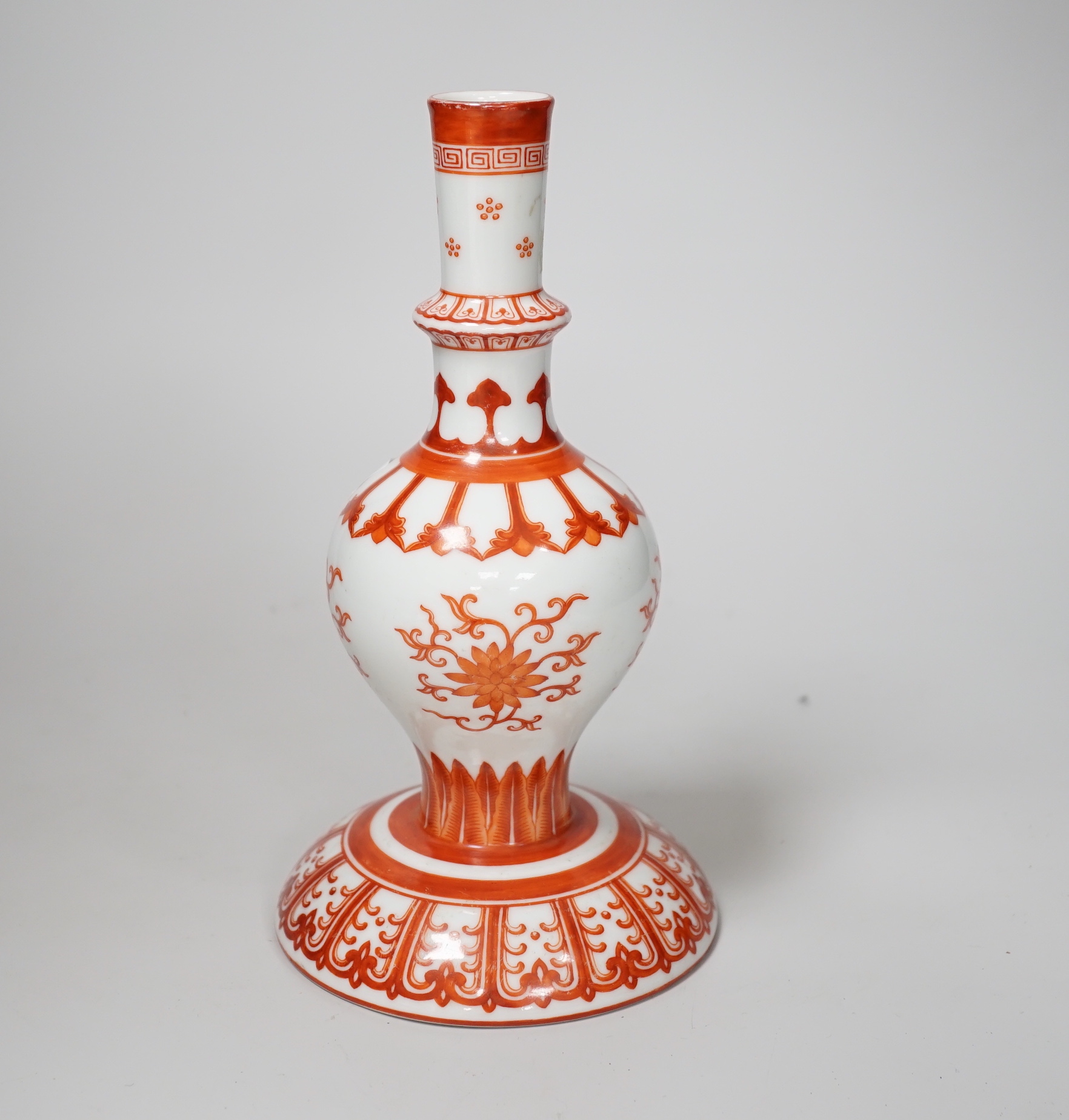 A Chinese candlestick hand painted with flowers with fitted case, 23cm high                                                                                                                                                 