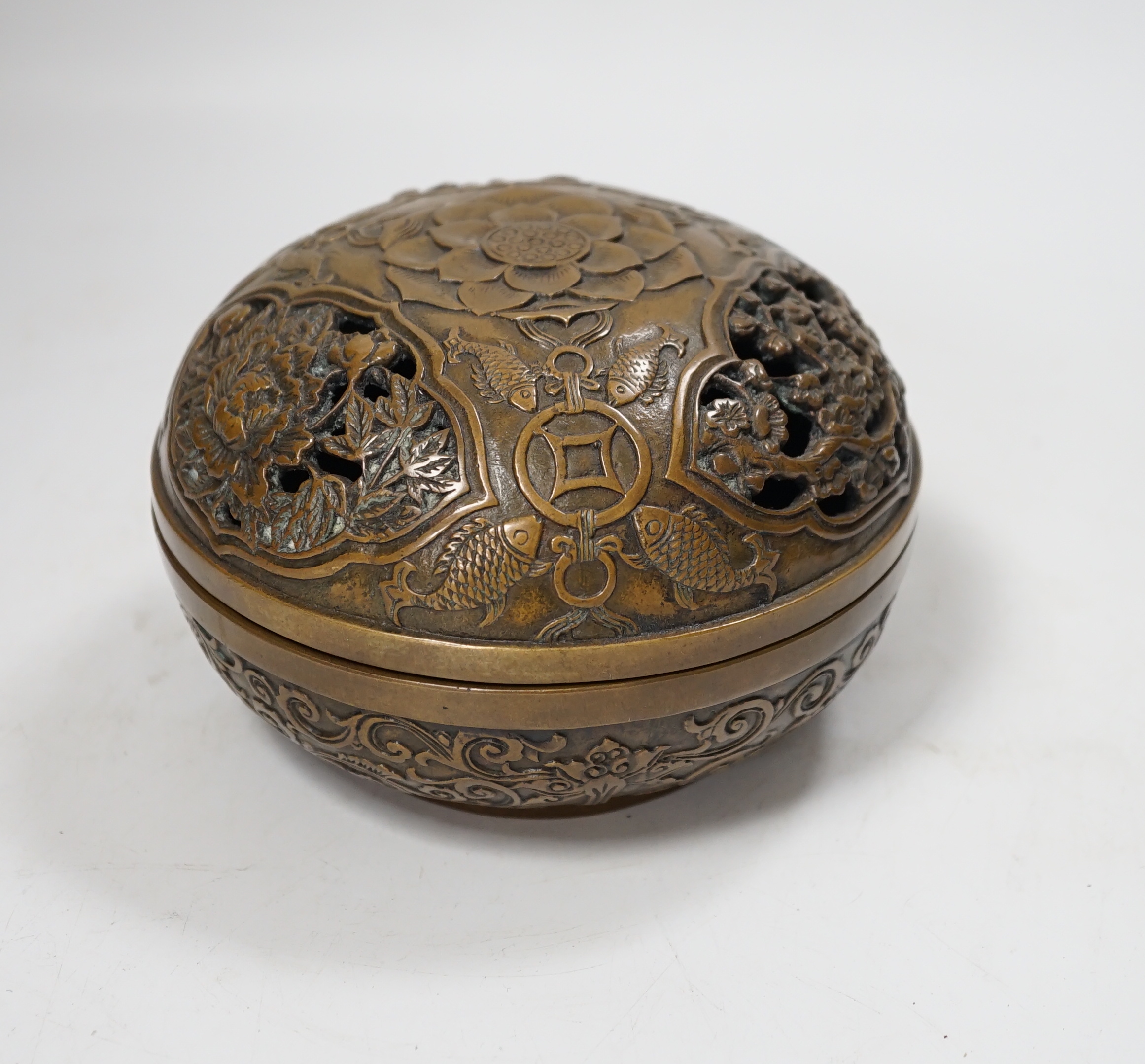 A Chinese circular cast bronze censer, 13.5cm diameter                                                                                                                                                                      
