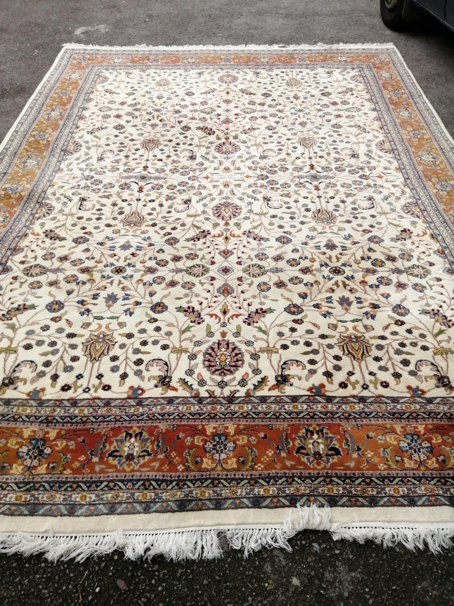 An Isphahan ivory ground carpet, 420 x 302cm                                                                                                                                                                                