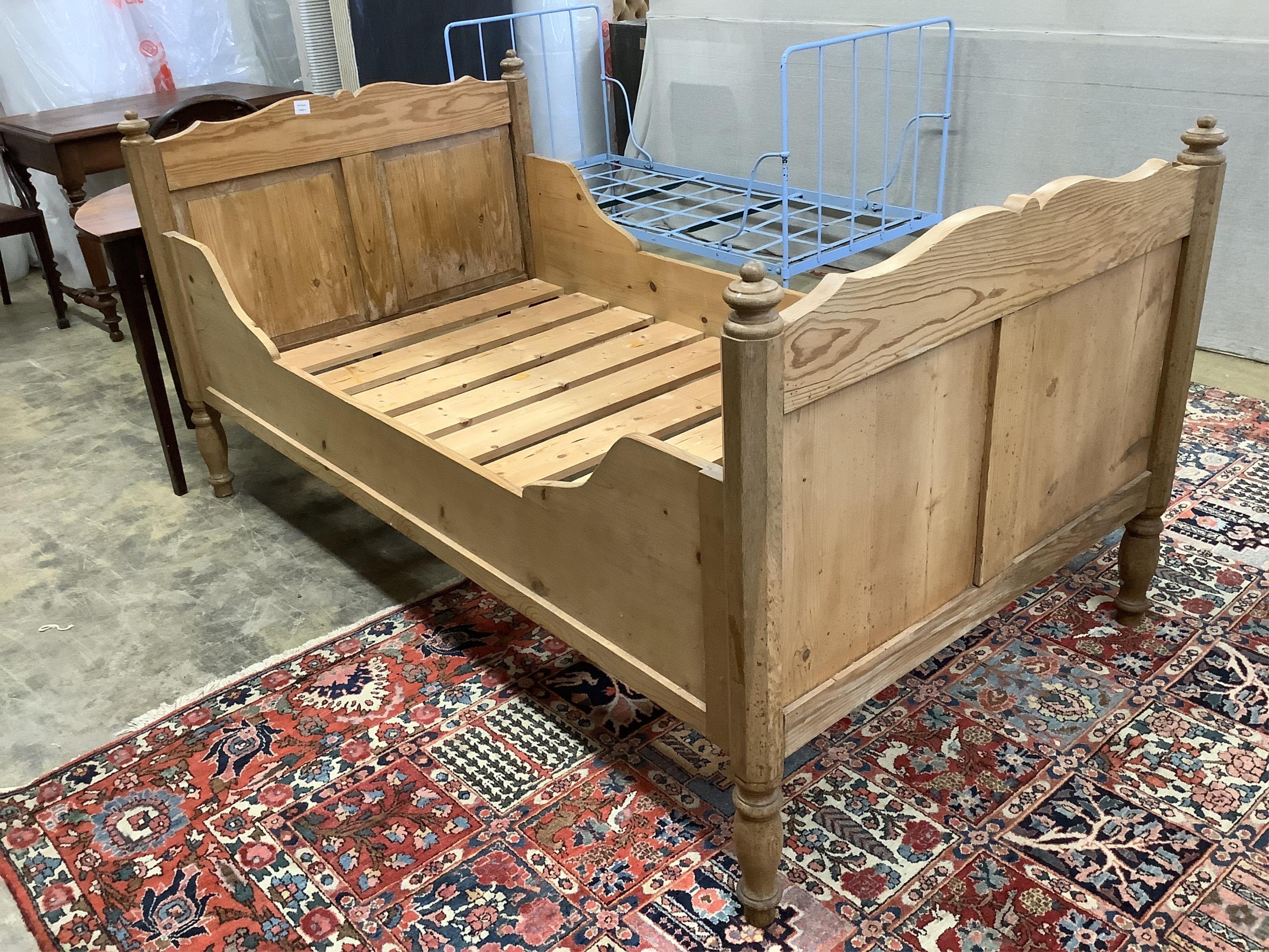 A 19th century Continental pine single bed frame, width 110cm, length 199cm, height 99cm                                                                                                                                    