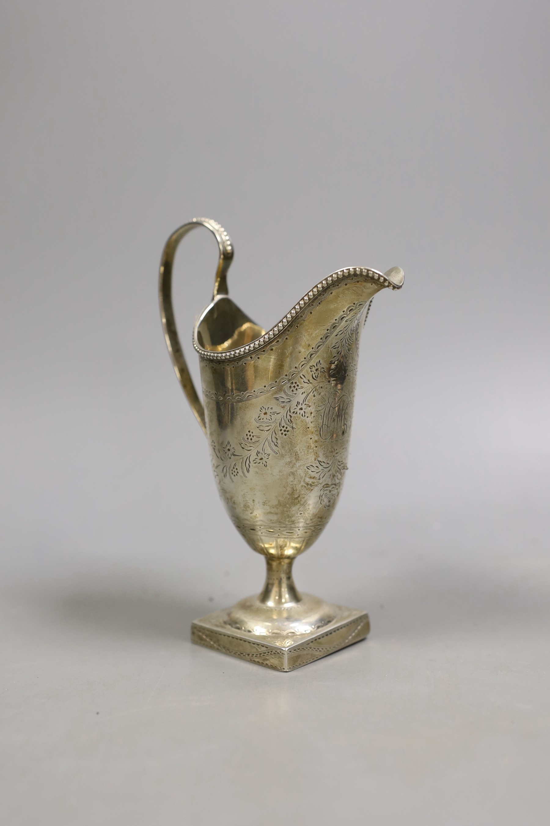 A George III silver cream jug, John Lambe, London, 1781, 16.2cm, `27 grams.                                                                                                                                                 