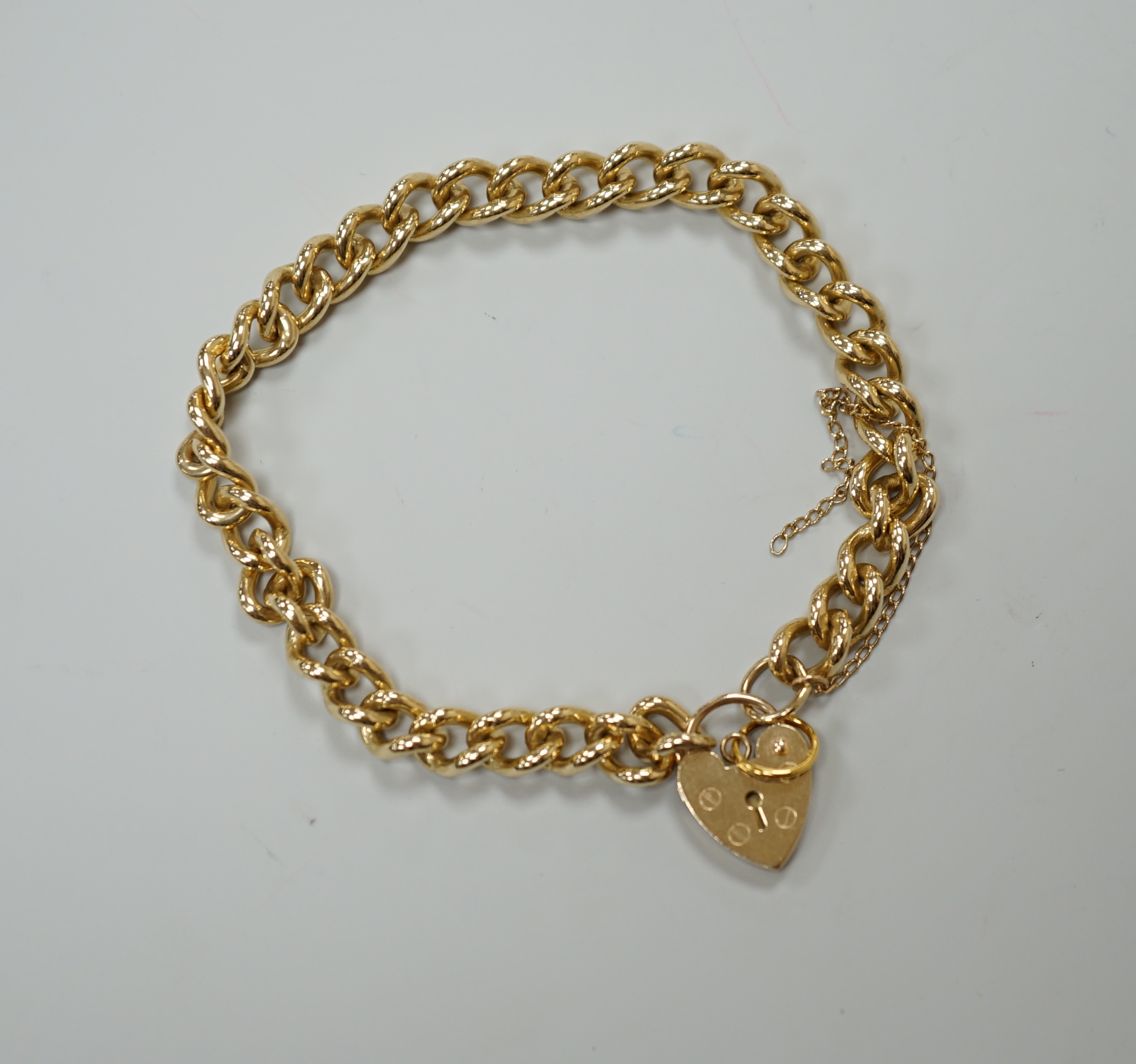 A 9ct gold curblink bracelet, with padlock clasp, 16.4 grams                                                                                                                                                                