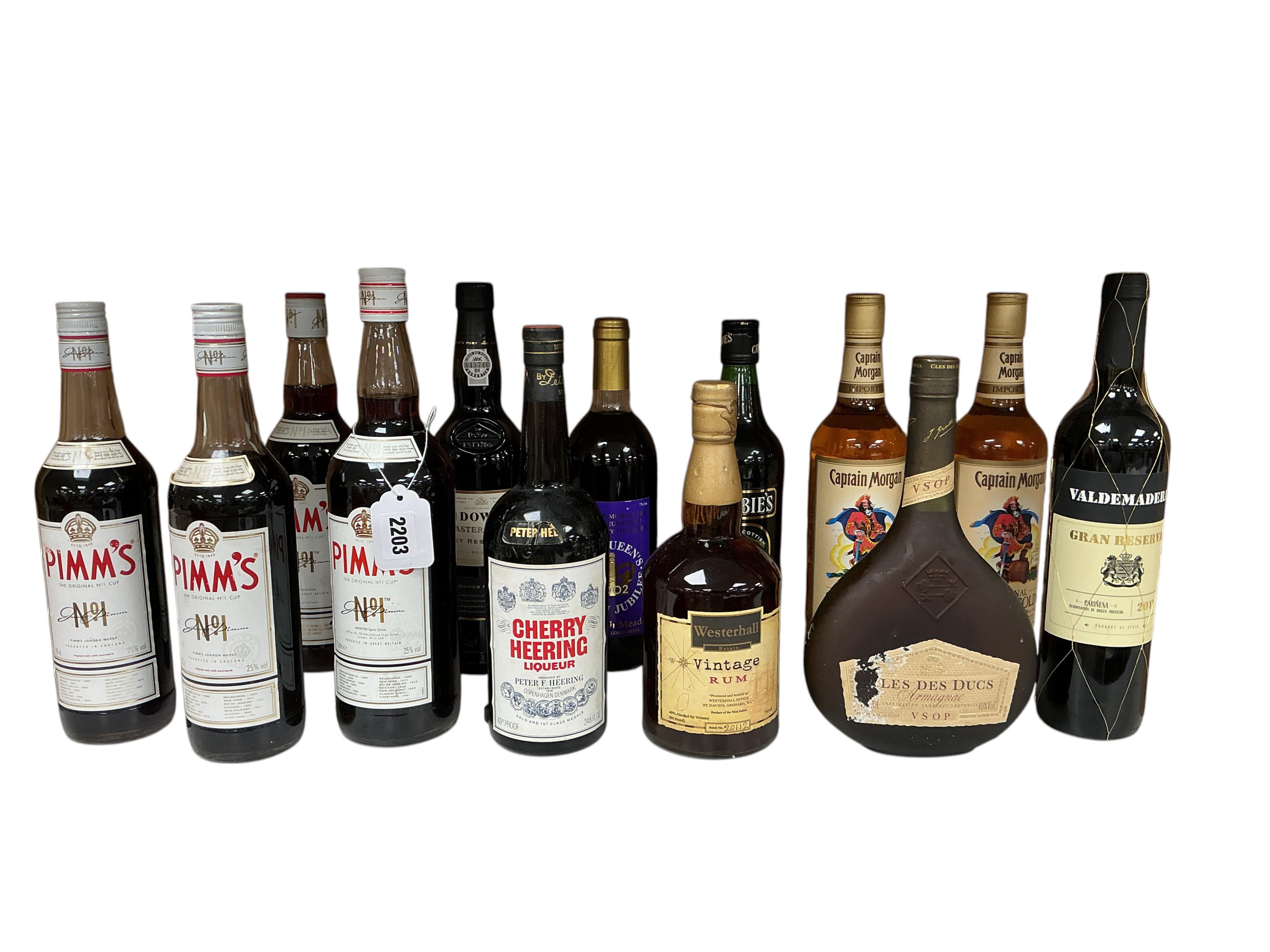 A Thirteen bottles of assorted spirits, port, wine and liqueur to ...