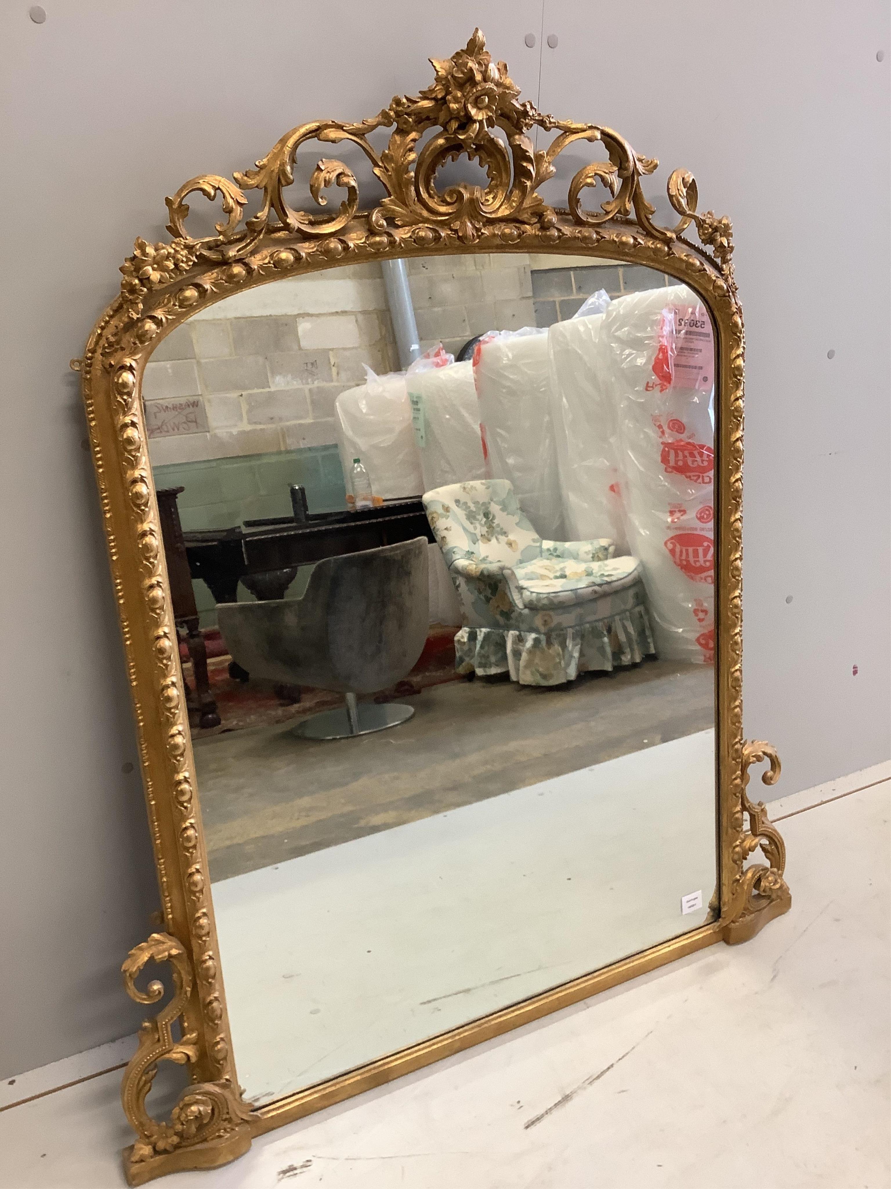 A Victorian giltwood and composition overmantel mirror, width 112cm, height 134cm. Condition - good                                                                                                                         