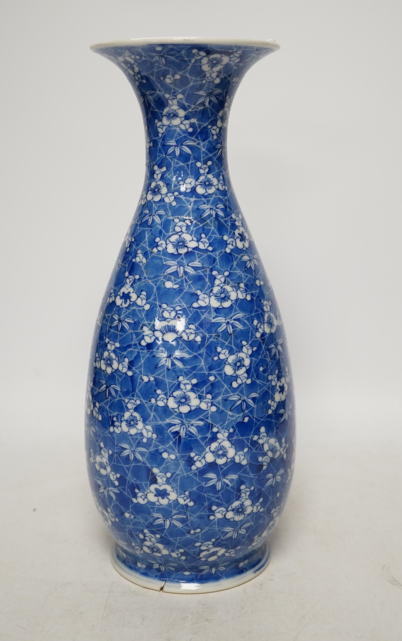 A Japanese blue and white Seto ware vase made by Yoshikyu Kato, 33cm high. Condition - base has a chip to rim and manufacturers glazing crack and all over pitting to glazing on body of vase                               