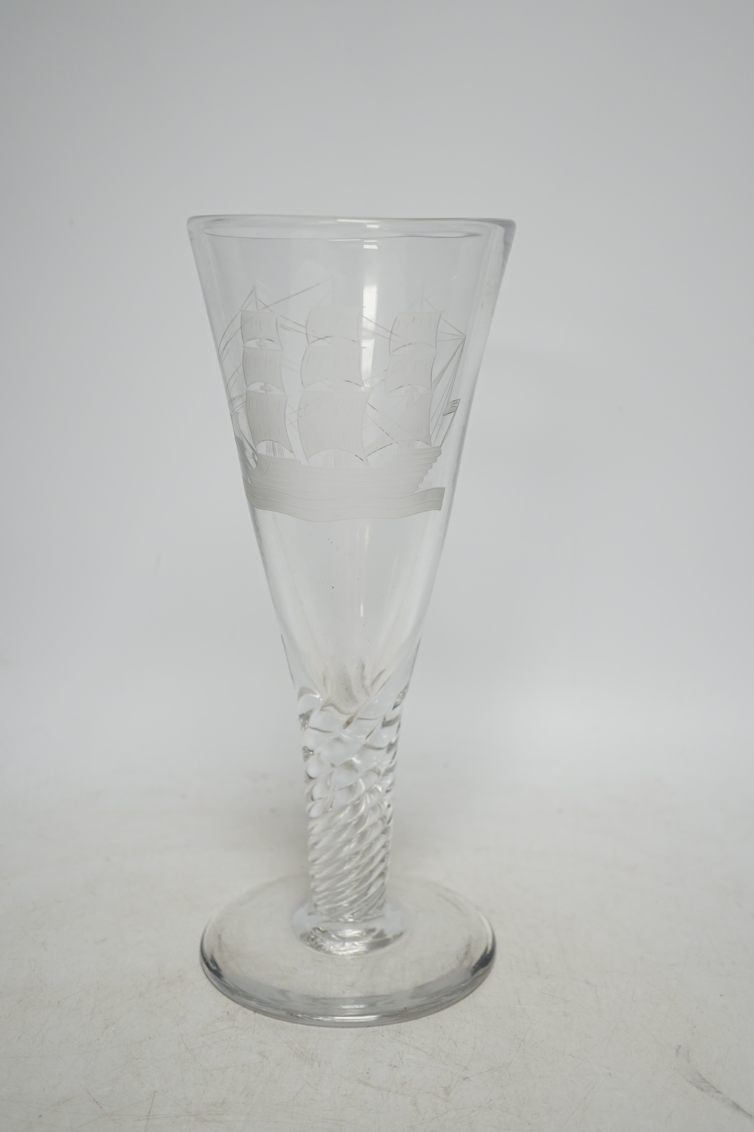 An early 20th century large goblet of drawn trumpet form, etched with a ship, 27cm. Condition - good                                                                                                                        