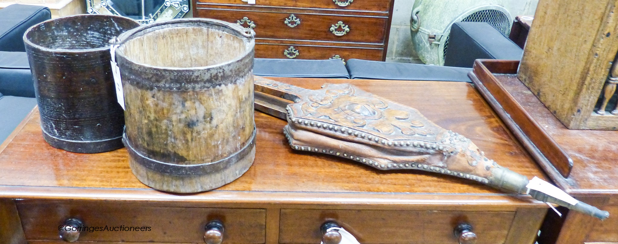 A 19th century coopered cast iron and ash bushel measure, a brass-bound ash gallon measure and a pair of Victorian oak and brass long-handled bellows                                                                       