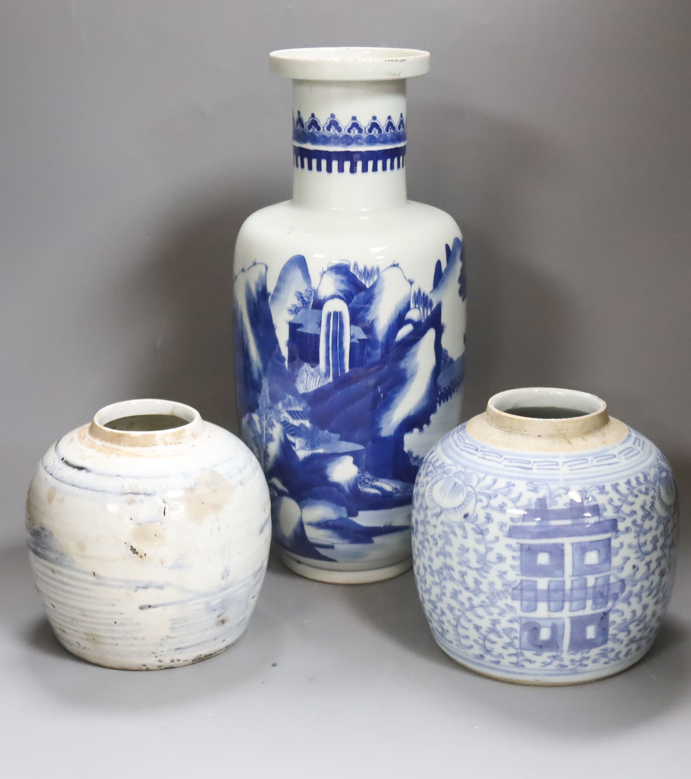 A Chinese blue and white rouleau vase and two jars, 19th century and later, 38cm                                                                                                                                            