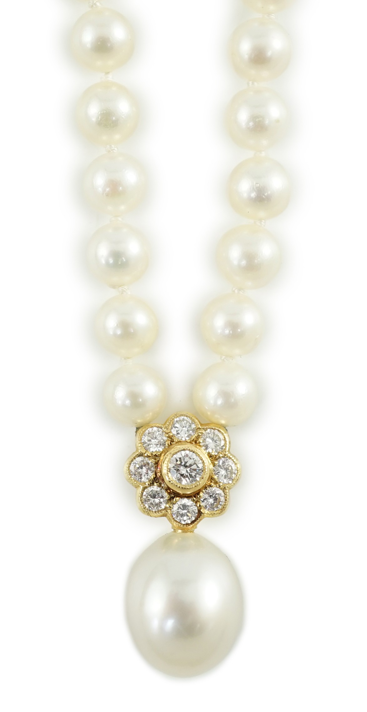 A late 1990's single strand cultured pearl and diamond cluster set necklace                                                                                                                                                 