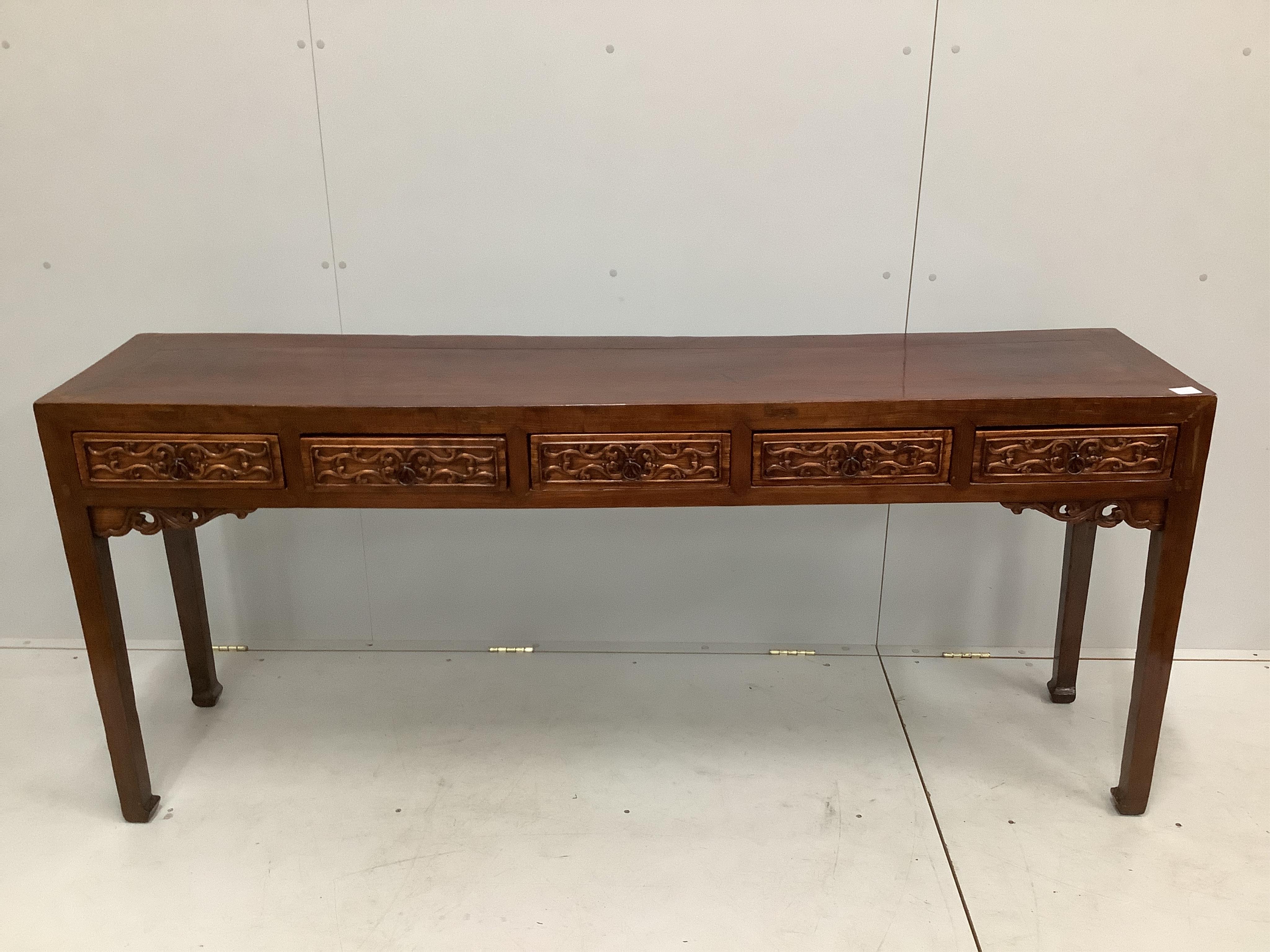 A 19th century Chinese elm serving table, width 190cm, depth 42cm, height 82cm                                                                                                                                              