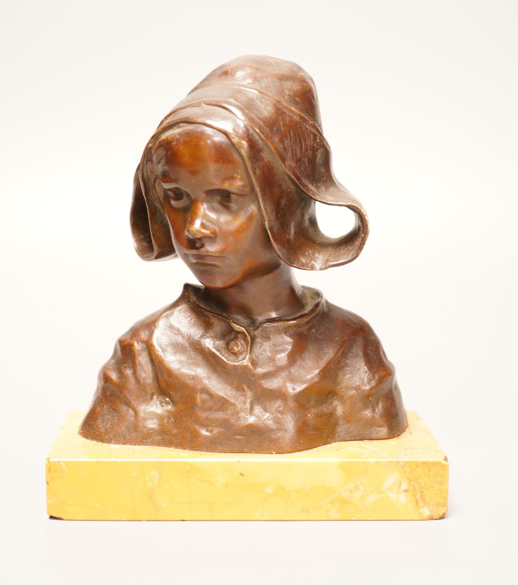 R. Mille (?) a small shoulder length bronze bust, study of a Dutch girl, 17cm tall                                                                                                                                          