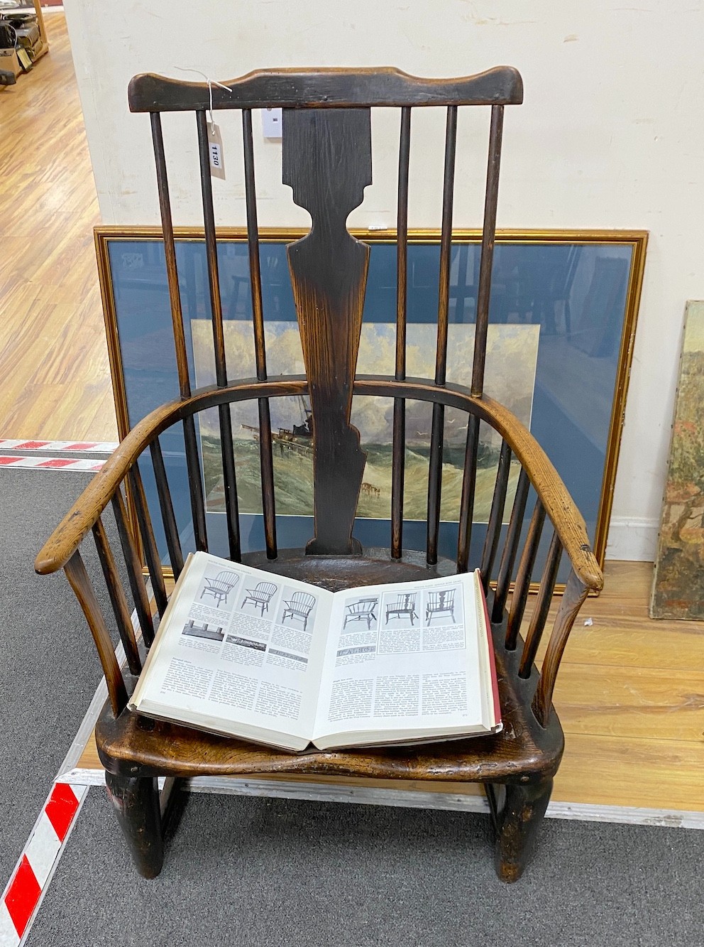 A mid 18th century West Country ash and elm Windsor armchair, (cut down), width 61cm, depth 41cm, height 99cm. (See figure SW31 page 271 Bernard Cotton The English Regional Chair).                                        