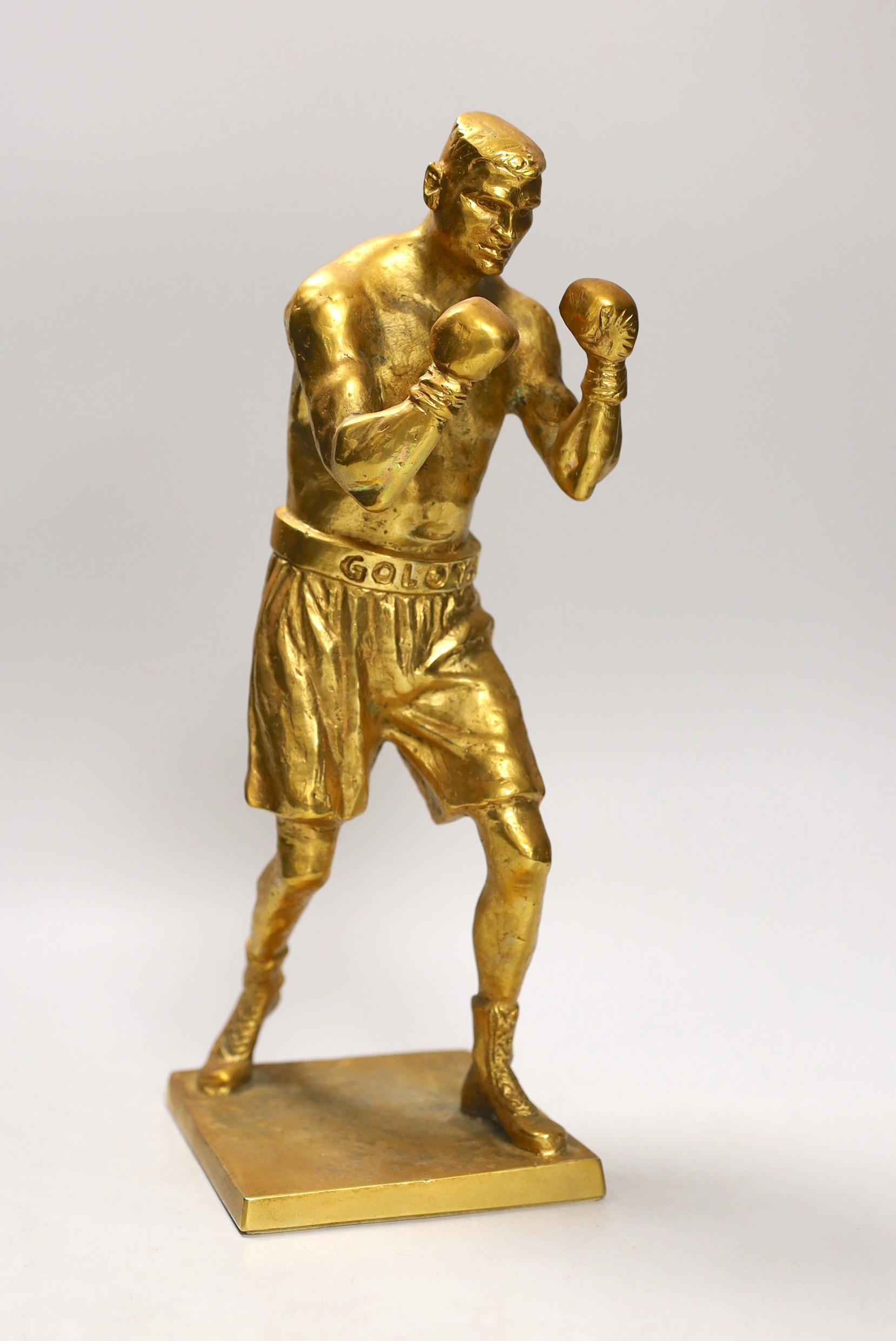 A cast bronze figure of boxer Andrew Golota, signed. 35cm tall                                                                                                                                                              