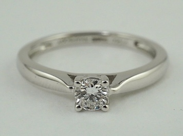 A modern Rhapsody platinum and solitaire diamond set ring, size N, gross weight 3.6 grams. Condition - good                                                                                                                 