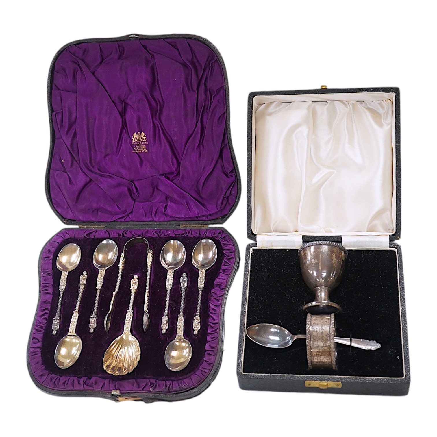 A cased set of six Victorian silver apostle teaspoons, tongs and caddy spoon, 1882, 3.7oz, and a cased George VI silver christening set comprising egg cup, napkin and spoon, 2.6oz. Condition - good.                      