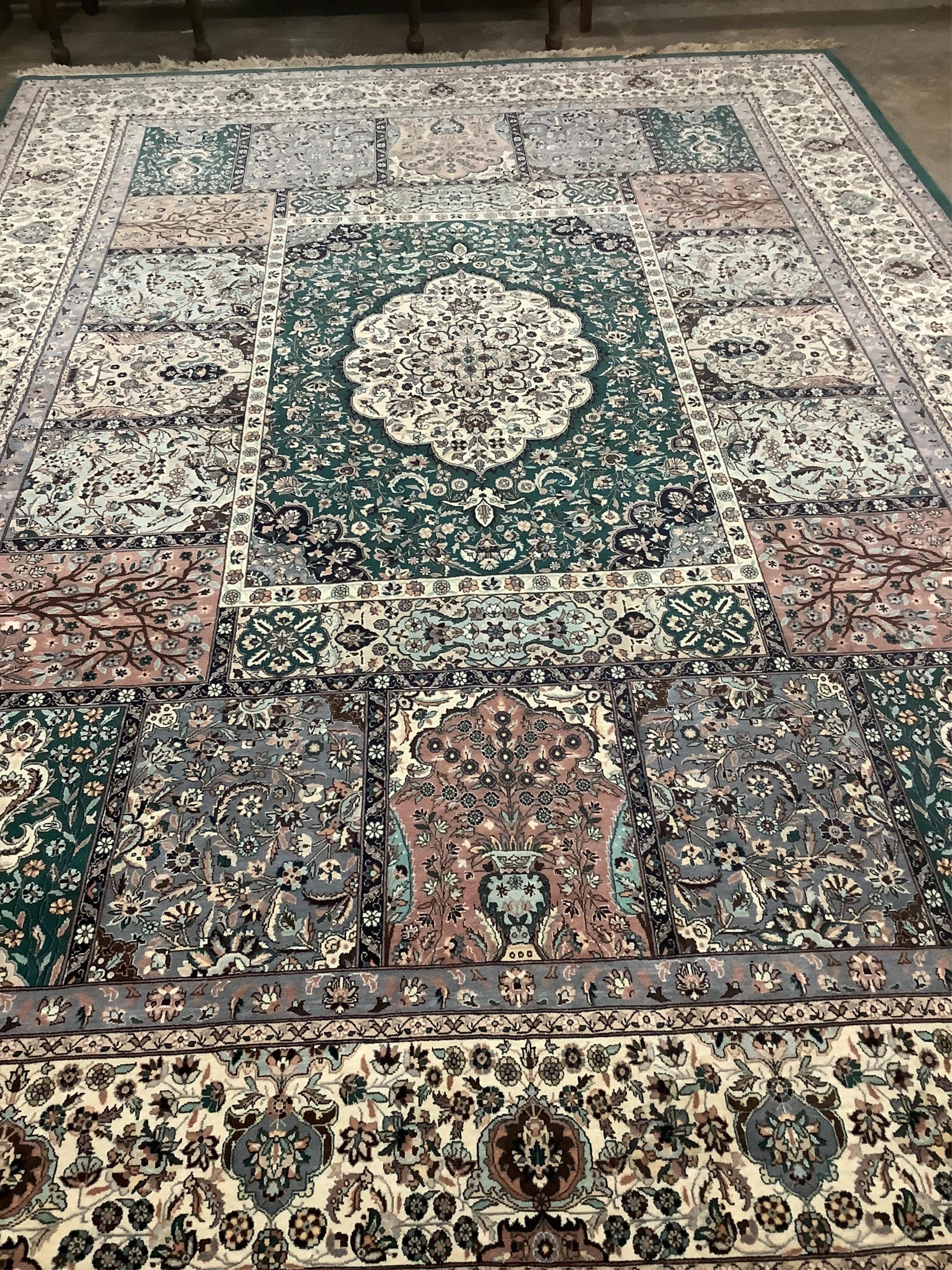 A large Indian Kashmir carpet, 420 x 300cm. Condition - good                                                                                                                                                                