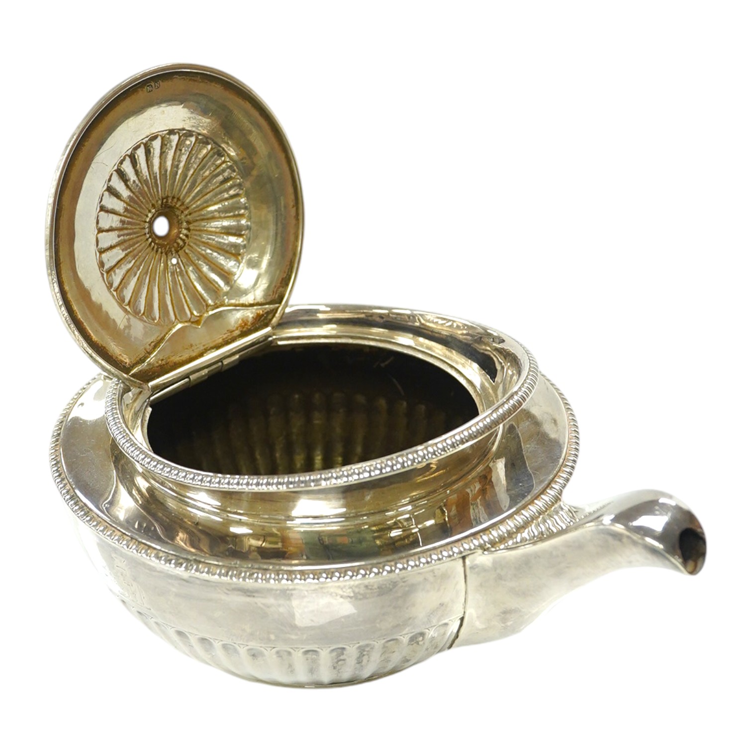 A George III demi-fluted silver teapot, lacking handled and knop, London, 1808, 22.1oz. Condition - poor                                                                                                                    