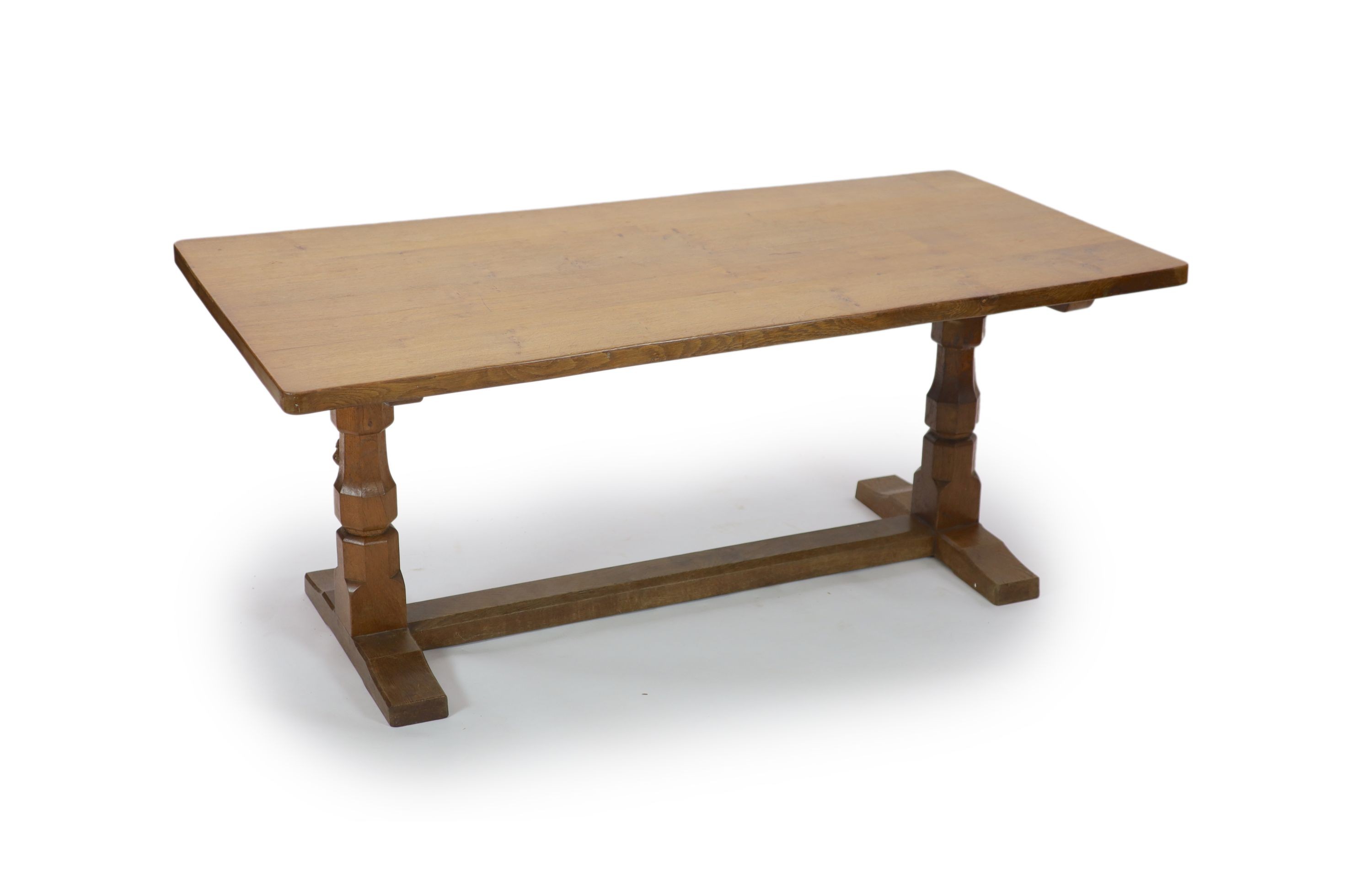 A Robert Thompson Mouseman adzed oak refectory table, W.180cm D.86cm H.74cm                                                                                                                                                 