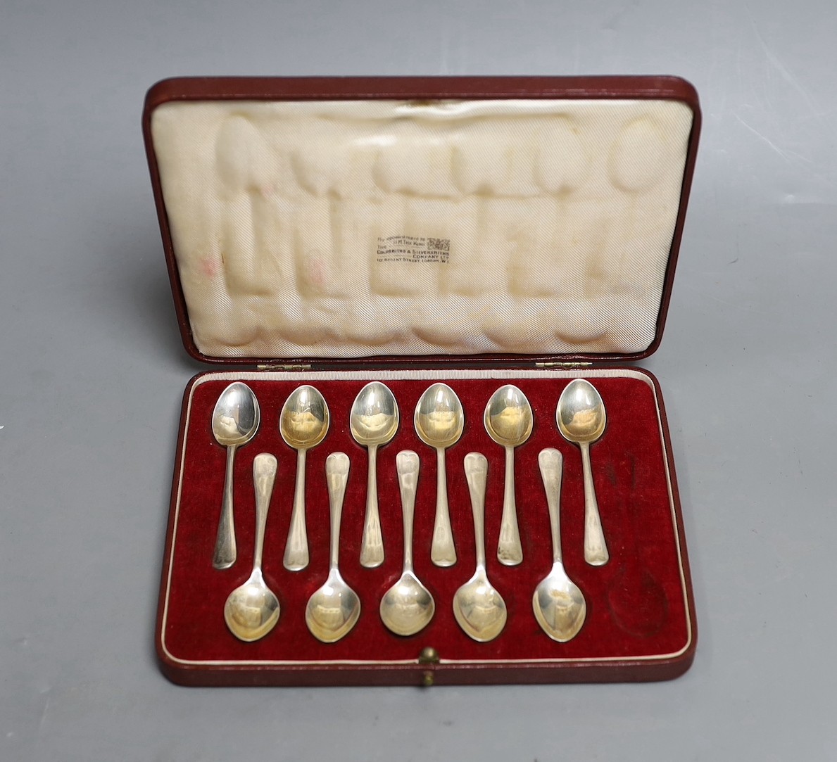 A cased set of eleven (of 12) George VI silver coffee spoons, Sheffield, 1950.                                                                                                                                              