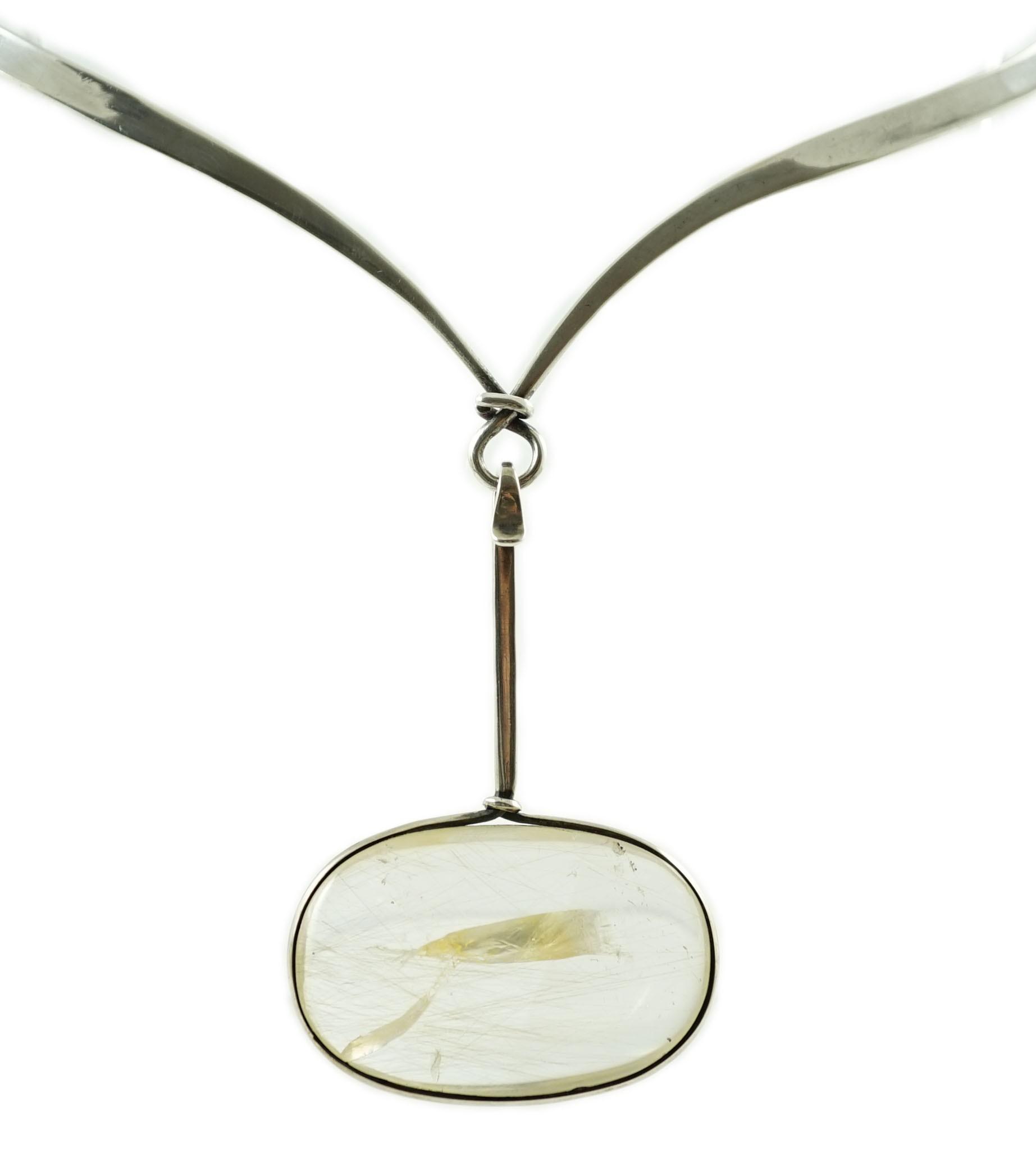 A Vivienne Torun for Georg Jensen Danish sterling silver and rutilated oval quartz set pendant necklace                                                                                                                     