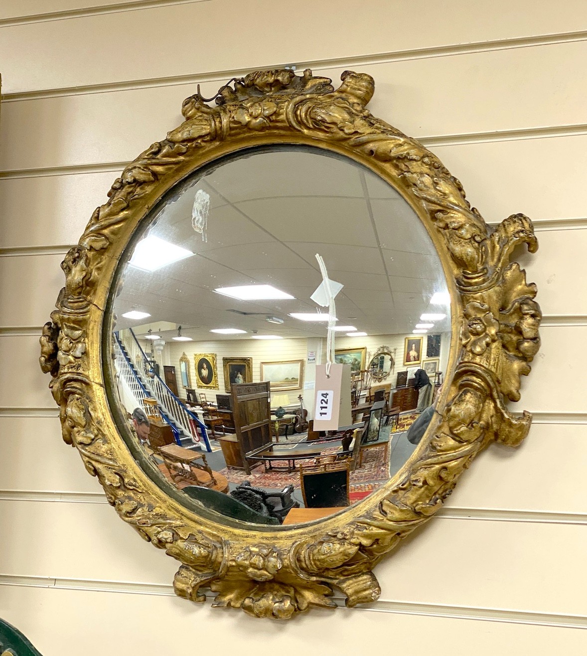 A 19th century circular and giltwood composition wall mirror, diameter 60cm                                                                                                                                                 