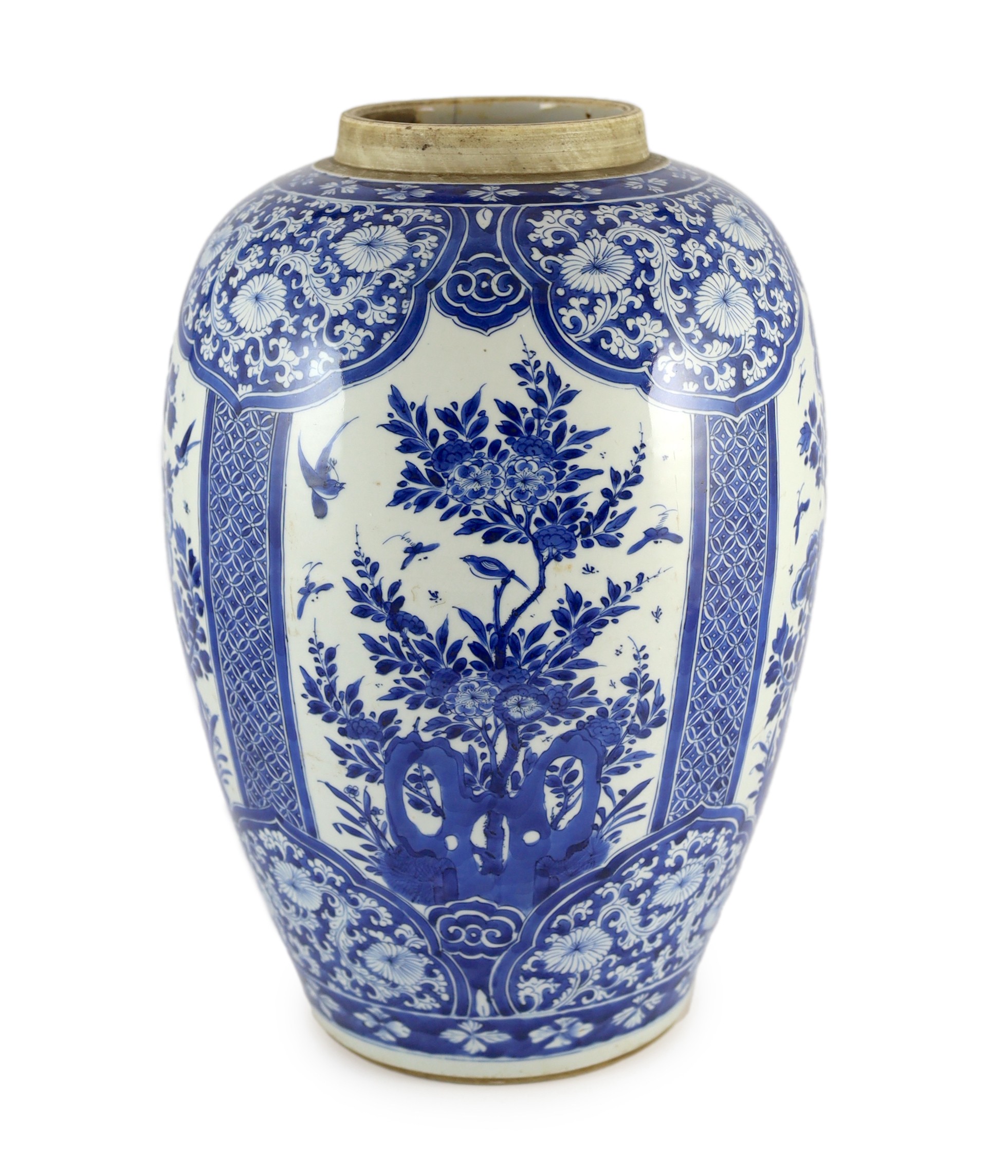 A large Chinese blue and white large ovoid jar, Kangxi period, 45cm high, cracked                                                                                                                                           
