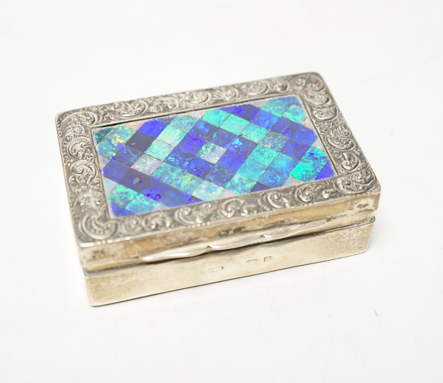 An Edwardian silver and black opal section set minaudiere?, marks rubbed, 73mm. Condition - poor                                                                                                                            