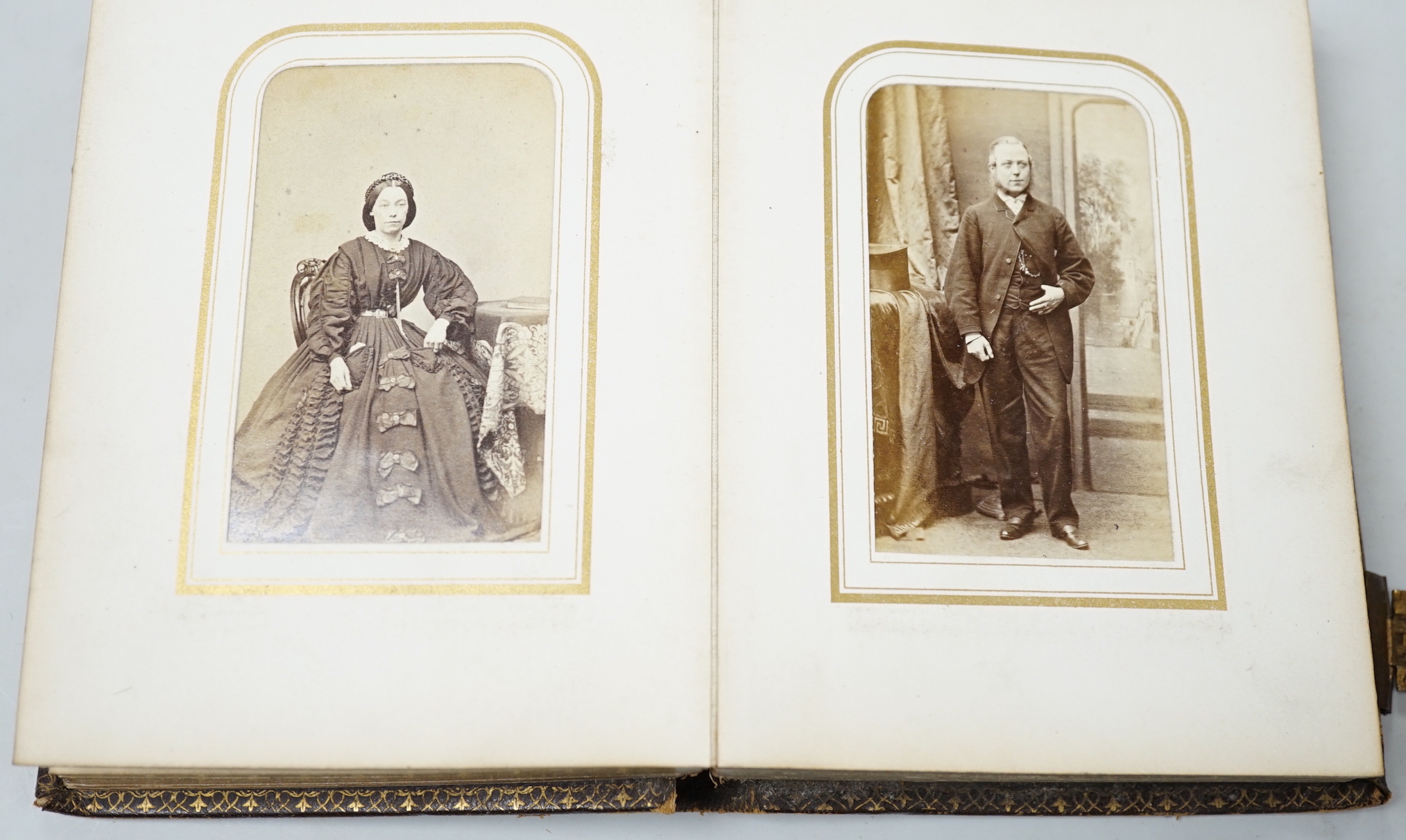 Two Victorian leather portrait photo albums, largest 16cm high, 12.5cm wide                                                                                                                                                 