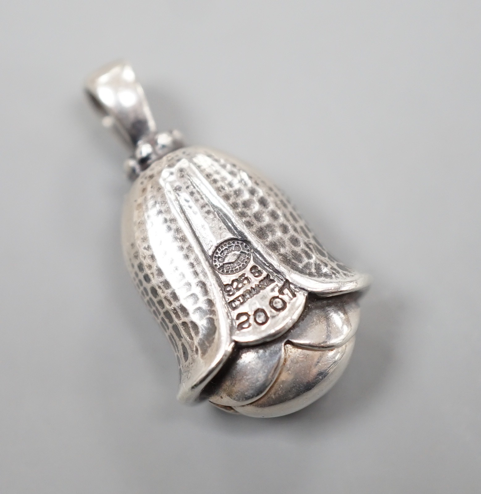 A Georg Jensen sterling artist pendant for the year 2007, of tulip form, 26mm.                                                                                                                                              