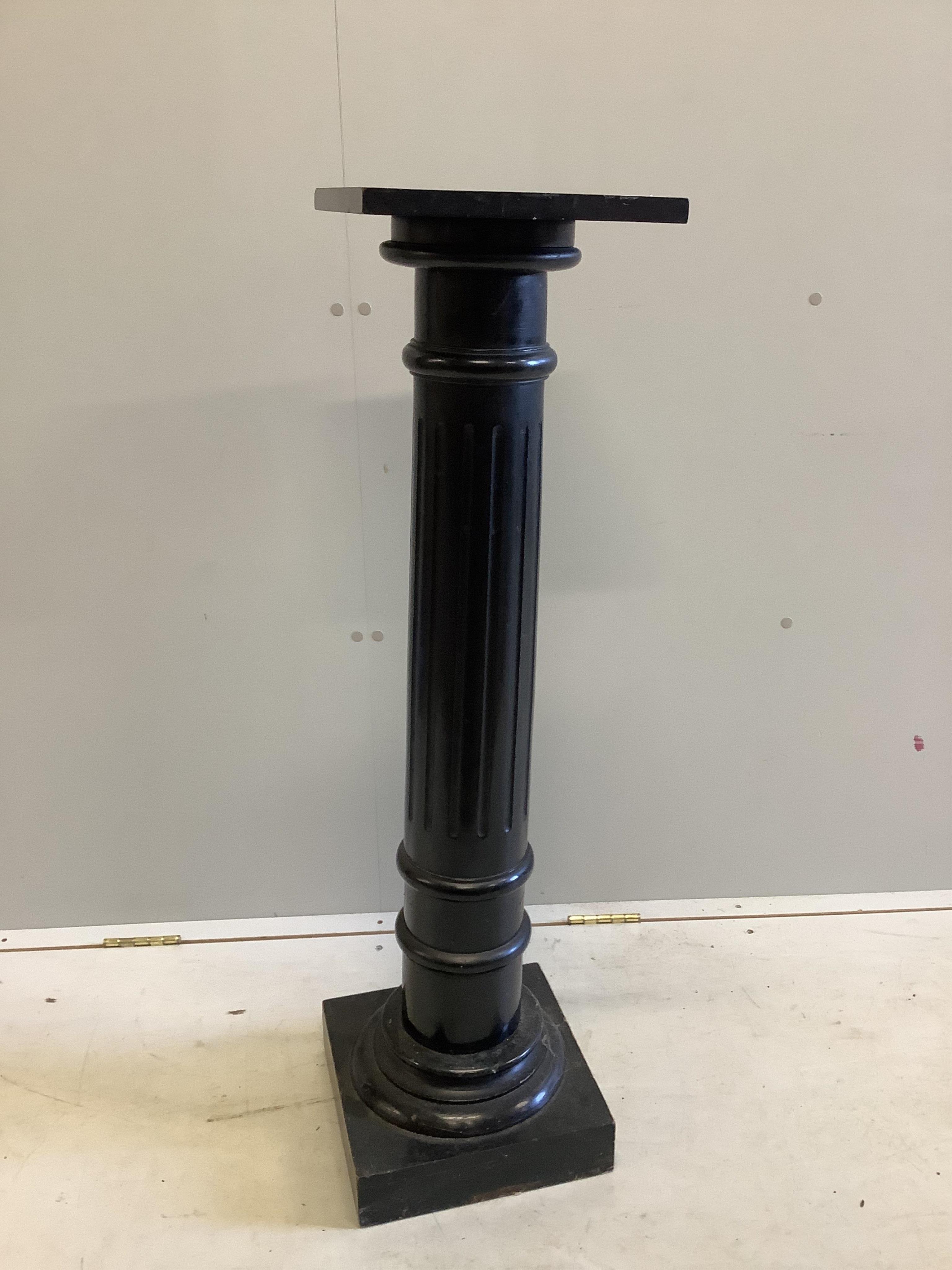 A Victorian ebonised wood pedestal, height 103cm. Condition - fair to good                                                                                                                                                  