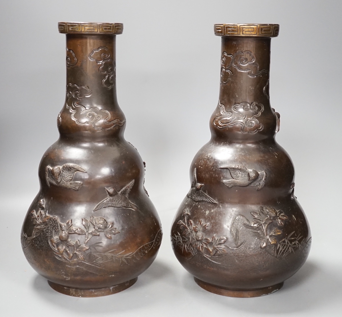 A pair of Japanese Meiji bronze vases. 30cm                                                                                                                                                                                 