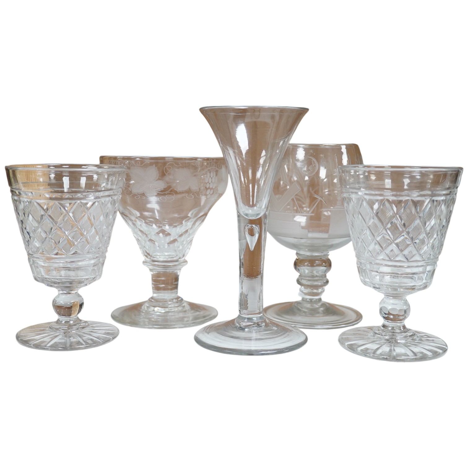 A George III tear drop cordial glass, a pair of hobnail cut bucket bowl rummers and a vineous engraved glass, tear drop glass 18cm high (5). Condition - good                                                               