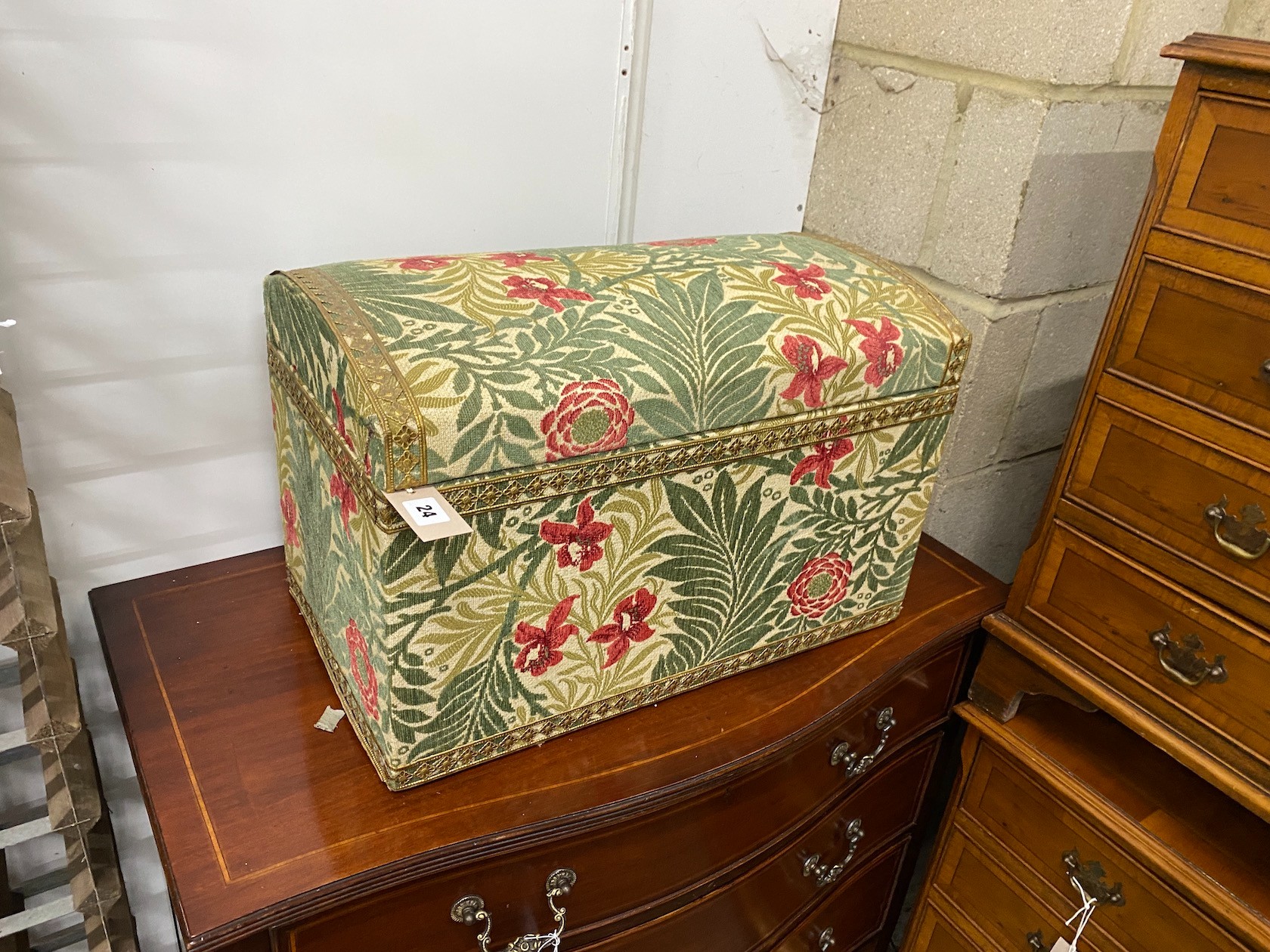 A small domed top box with floral tapestry cover, width 57cm, height 37cm                                                                                                                                                   