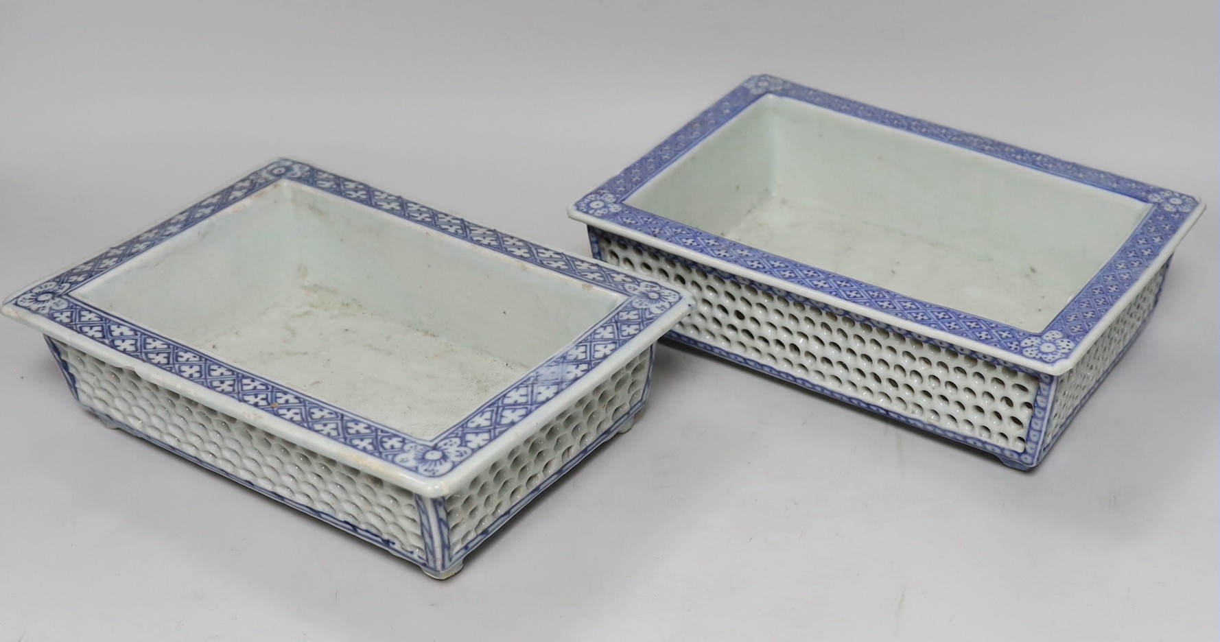 Two 19th century Chinese blue and white double walled planters, 24cm wide, 16cms deep                                                                                                                                       