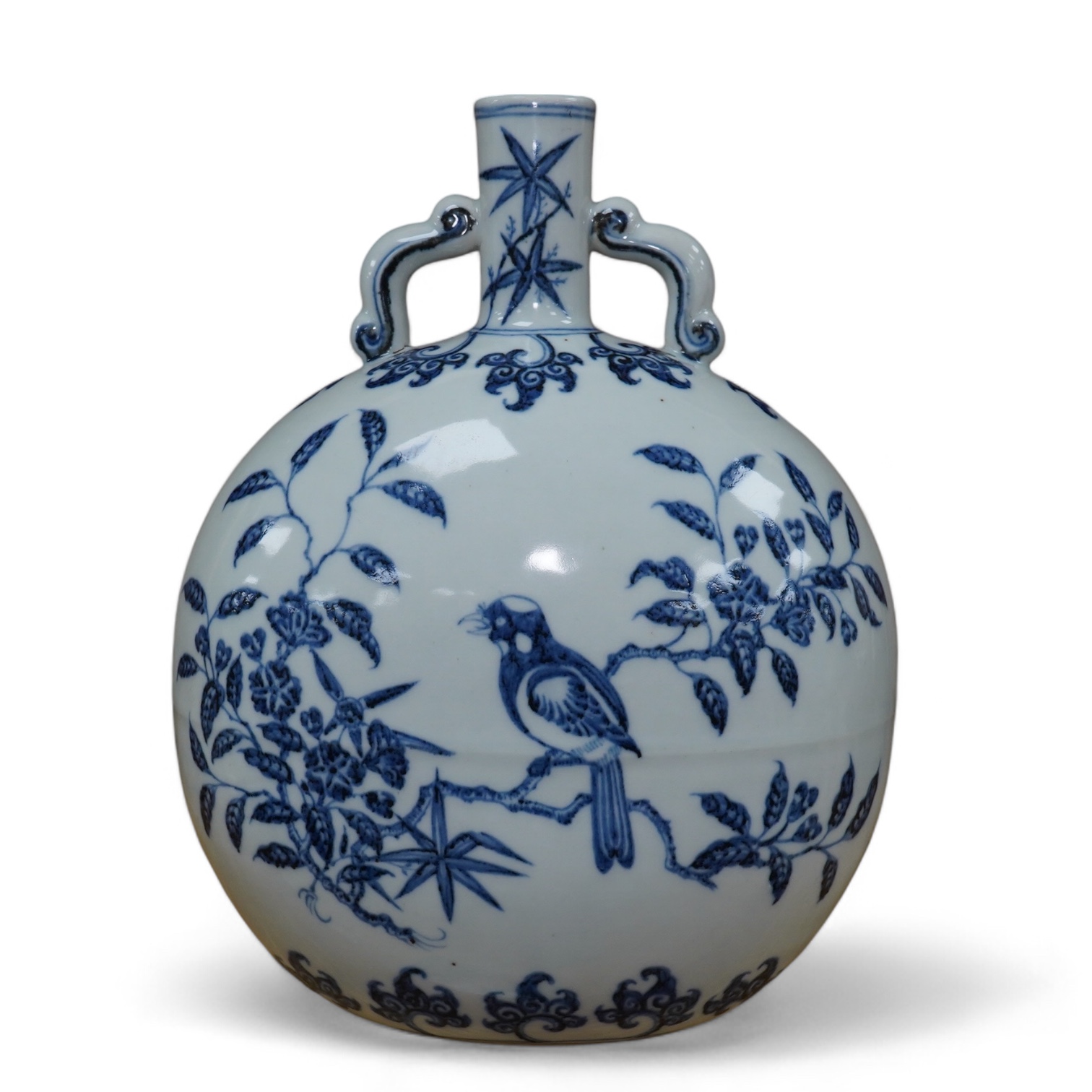 A Chinese blue and white two handled moon flask, decorated with birds on on branches, 29cm high. Condition - good                                                                                                           