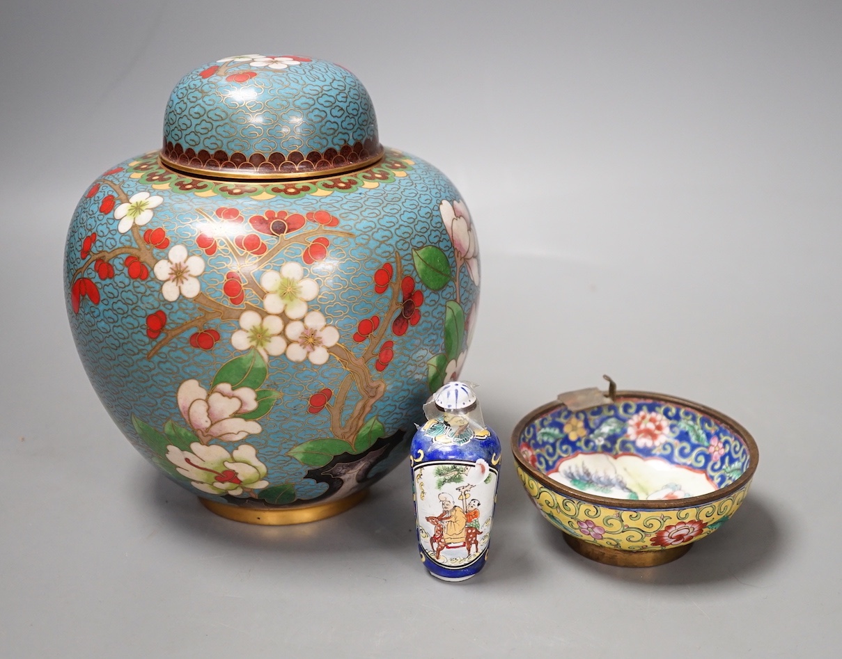 A Canton enamel tea bowl, snuff bottle, and a cloisonne enamel jar and cover                                                                                                                                                