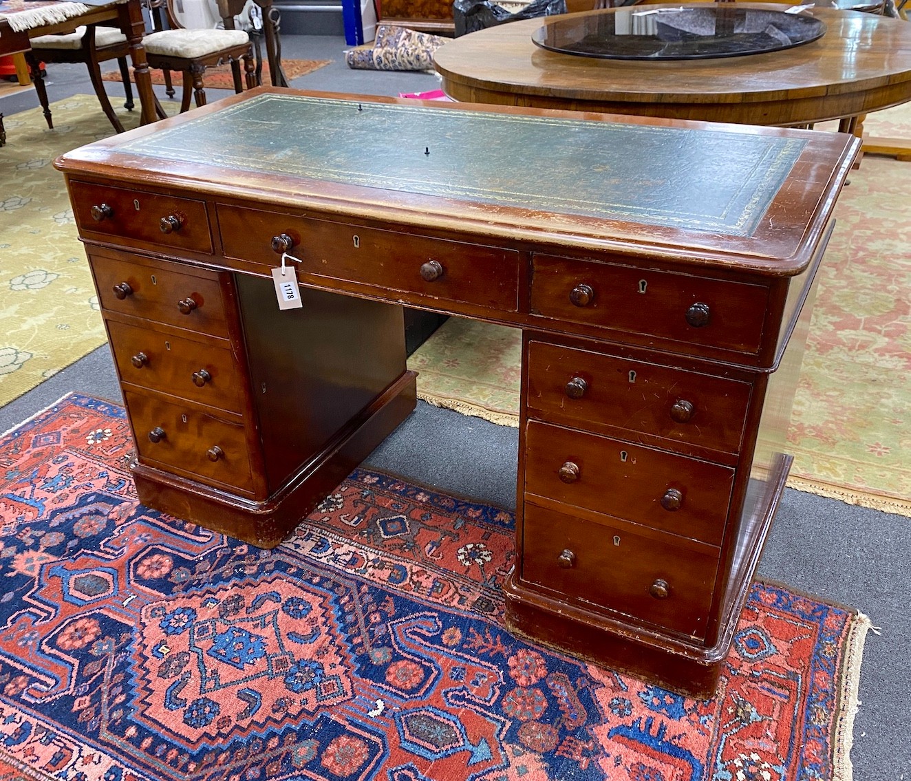 A Victorian mahogany pedestal desk, length 121cm, width 59cm, height 75cm                                                                                                                                                   