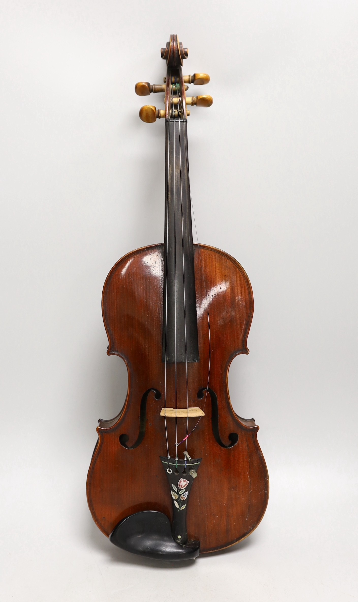 A French single back violin, interior label reads ‘Médio Fino’, back measures 35.5cm excl button. With case and bow                                                                                                         