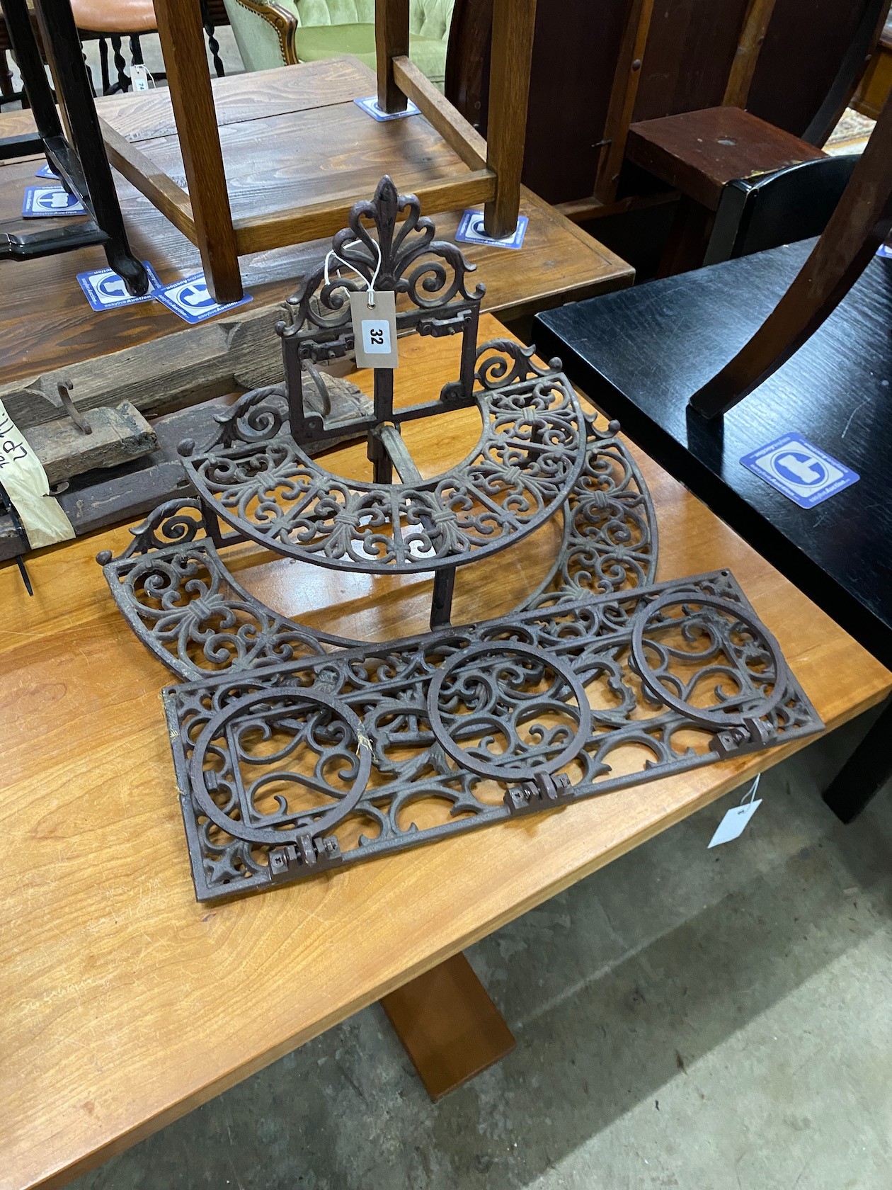 Two Victorian style cast metal pot racks, larger width 53cm                                                                                                                                                                 