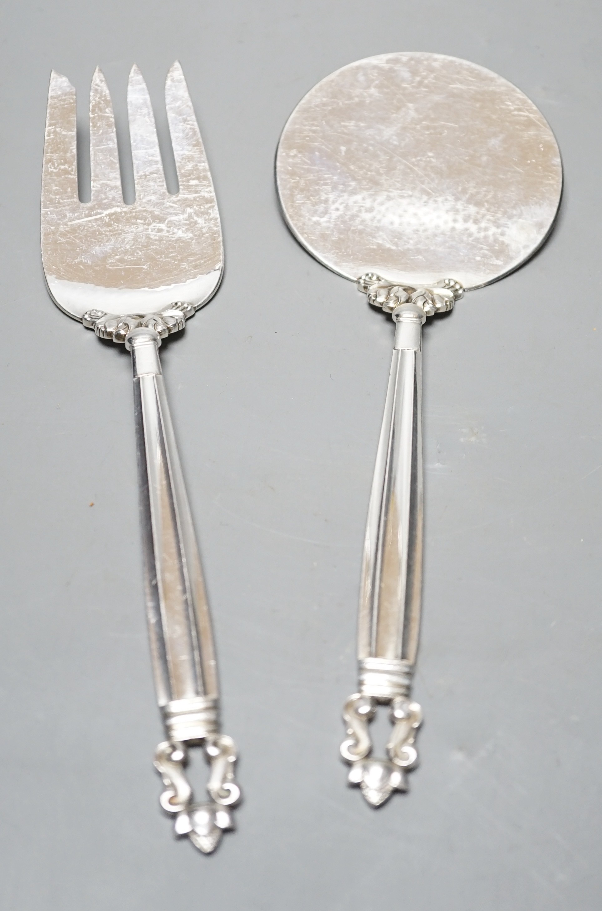 A boxed pair of Georg Jensen silver acorn pattern servers, London, import marks for 1967, 22.8cm, 6.2oz.                                                                                                                    