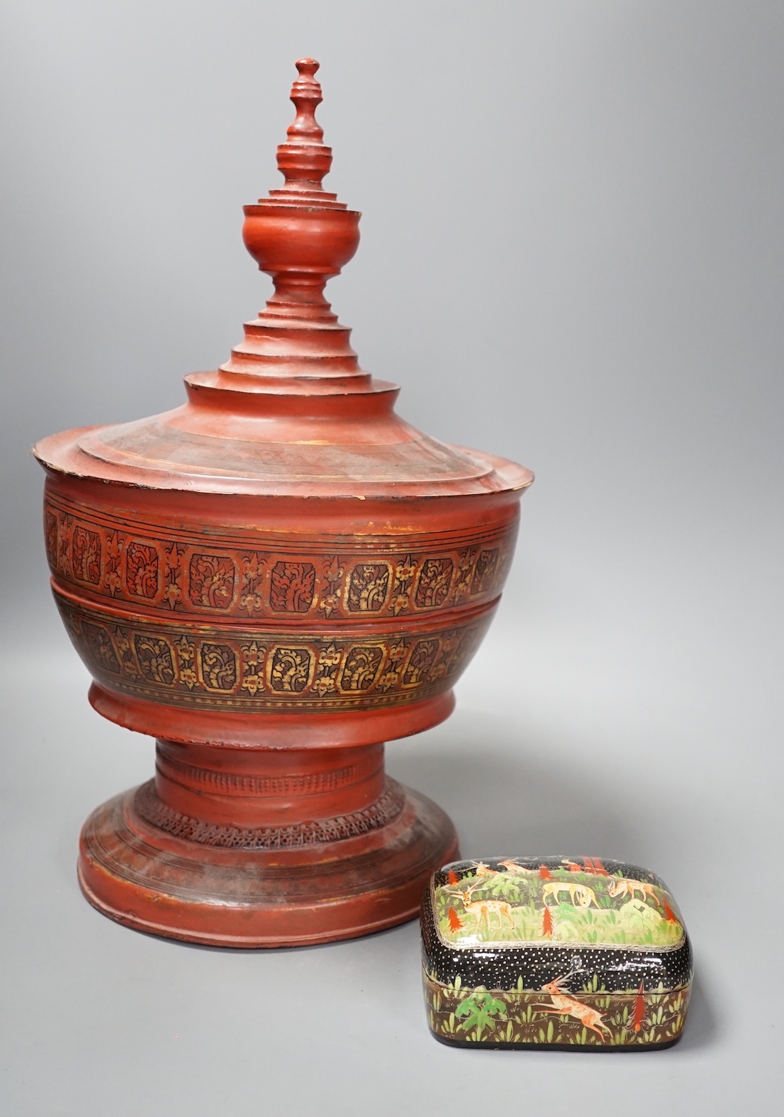 A Burmese lacquer box and cover, and a Persian lacquer box, tallest 41cm                                                                                                                                                    
