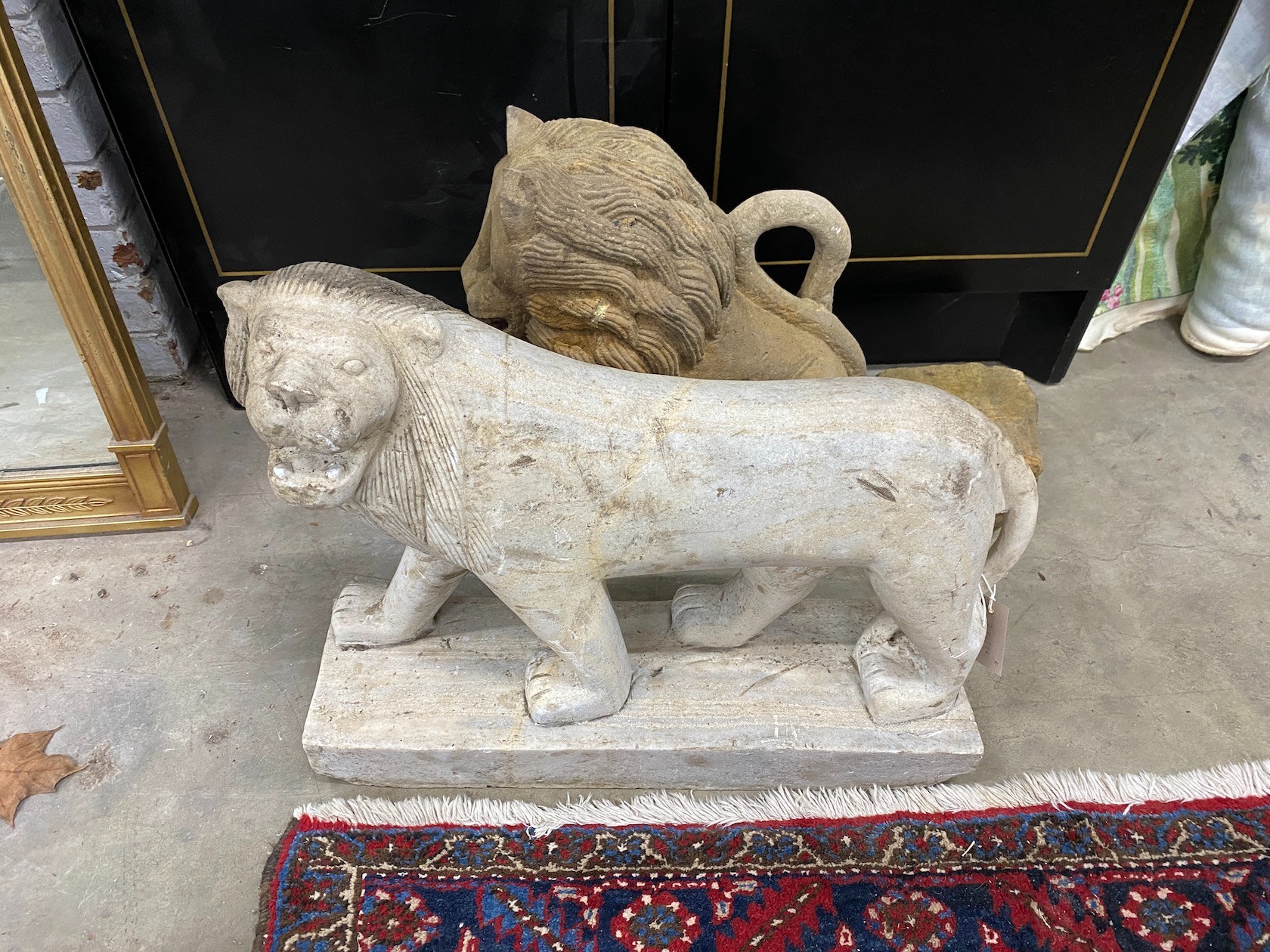 Two stone carvings, larger height 49cm                                                                                                                                                                                      