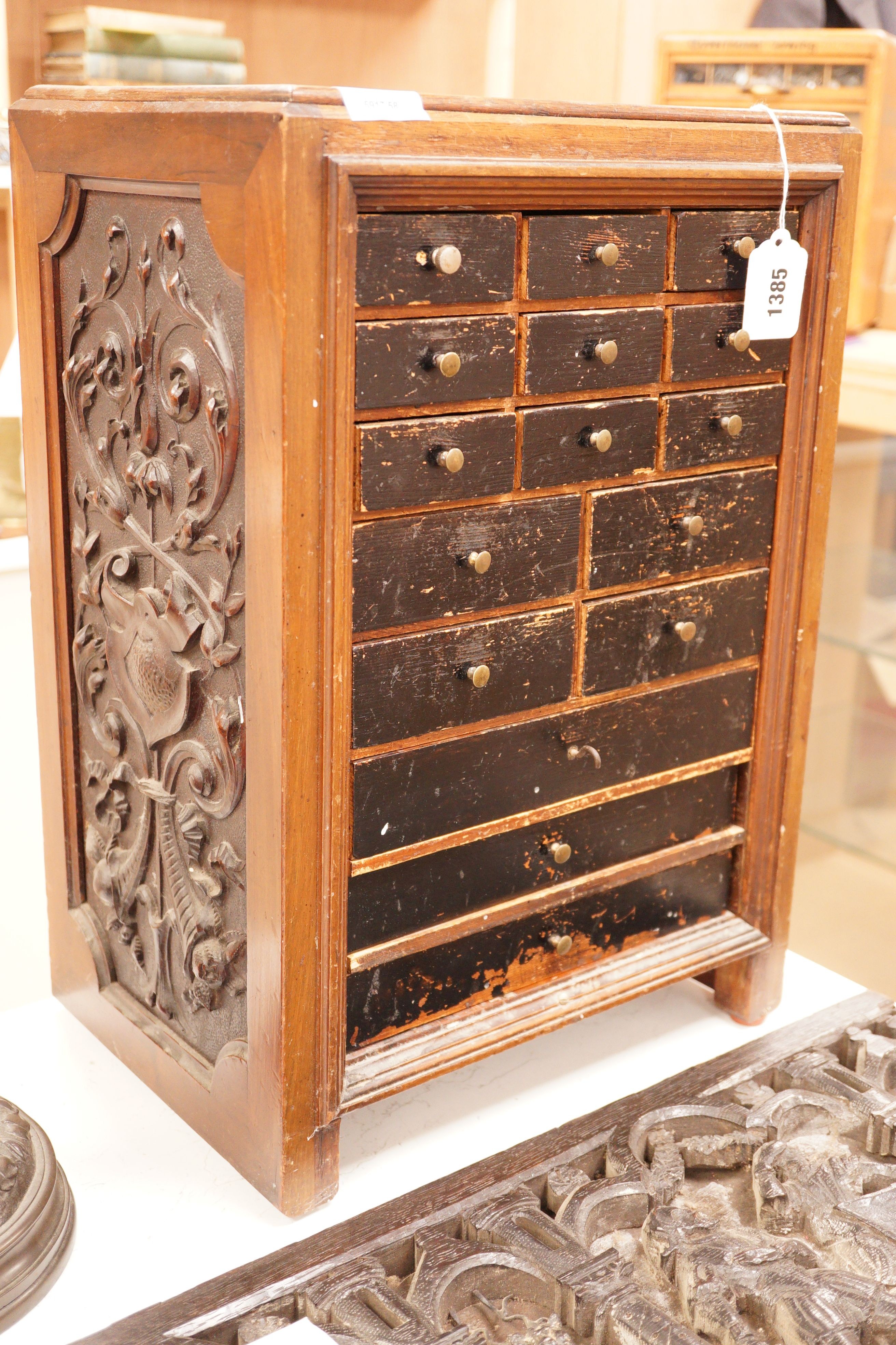 A Continental collector's miniature bank of drawers, 54cm tall                                                                                                                                                              