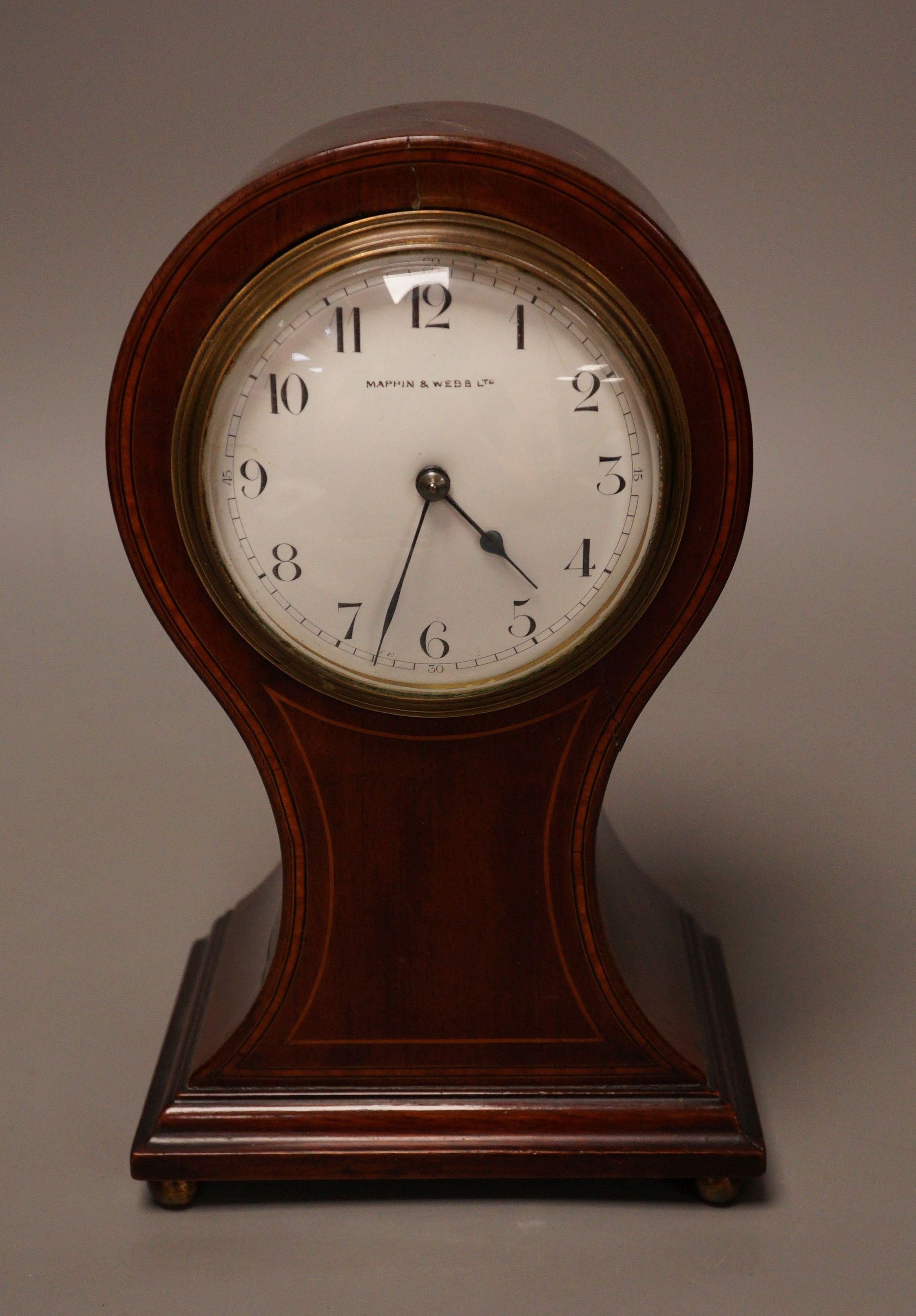 A Mappin & Webb mahogany mantel clock, 26cm tall                                                                                                                                                                            