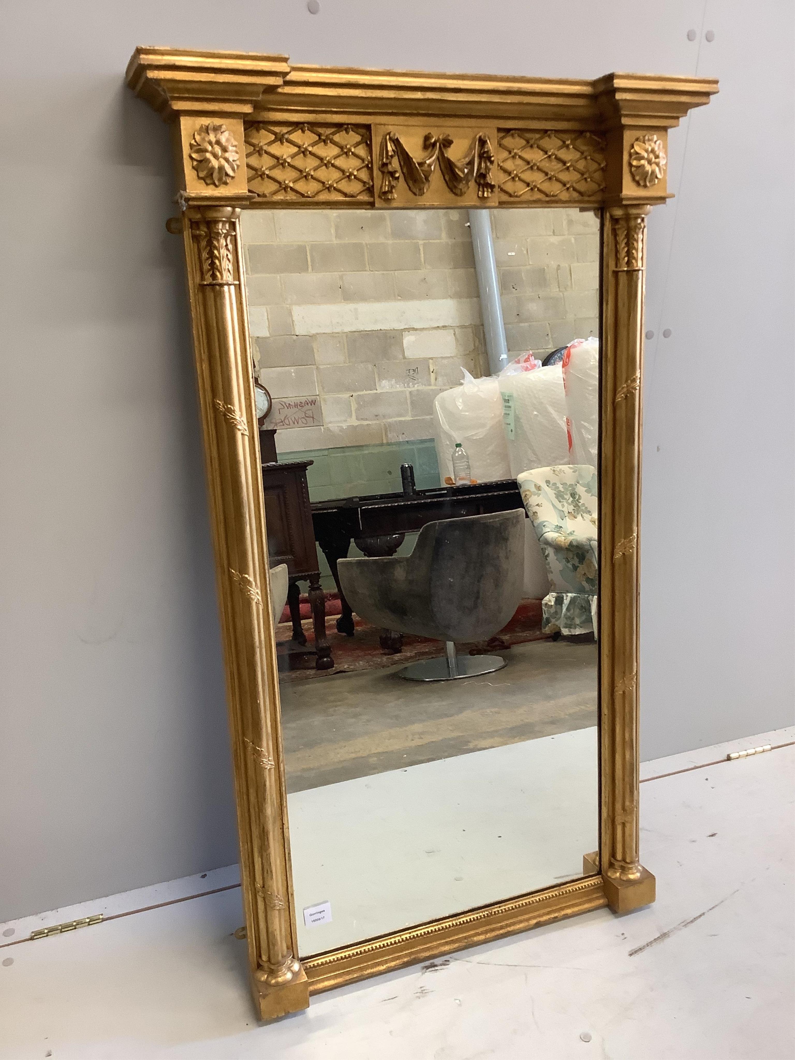 A Regency style giltwood and composition pier glass, width 76cm, height 127cm. Condition - good                                                                                                                             