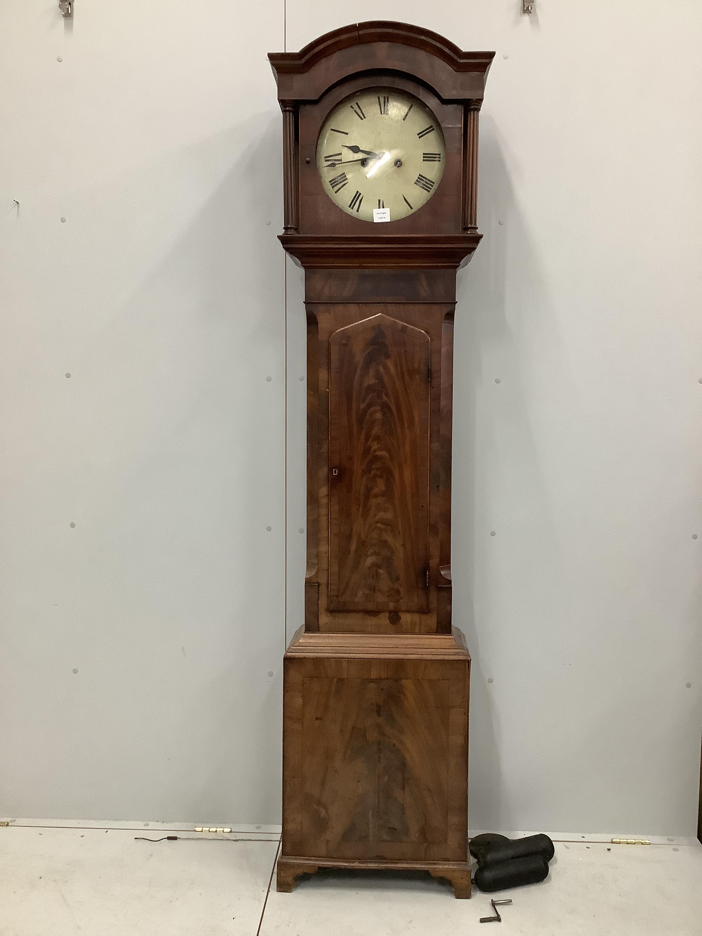 An early 19th century mahogany eight day longcase clock, height 217cm                                                                                                                                                       