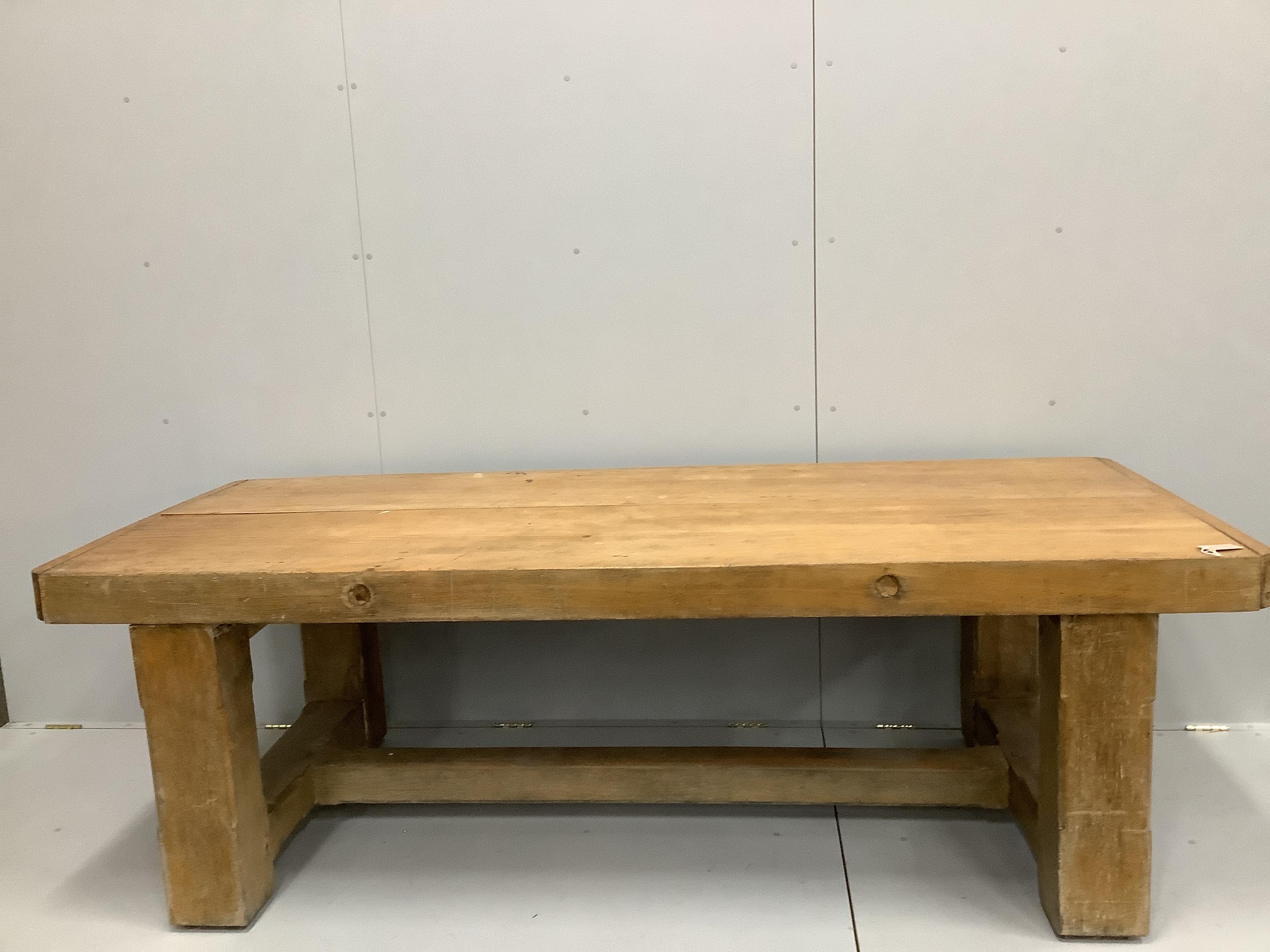 An early 20th century rectangular oak and beech kitchen preparation table the 9.5cm thick cleated twin plank top on chamfered square legs, width 231cm, depth 97cm, height 76cm.                                            