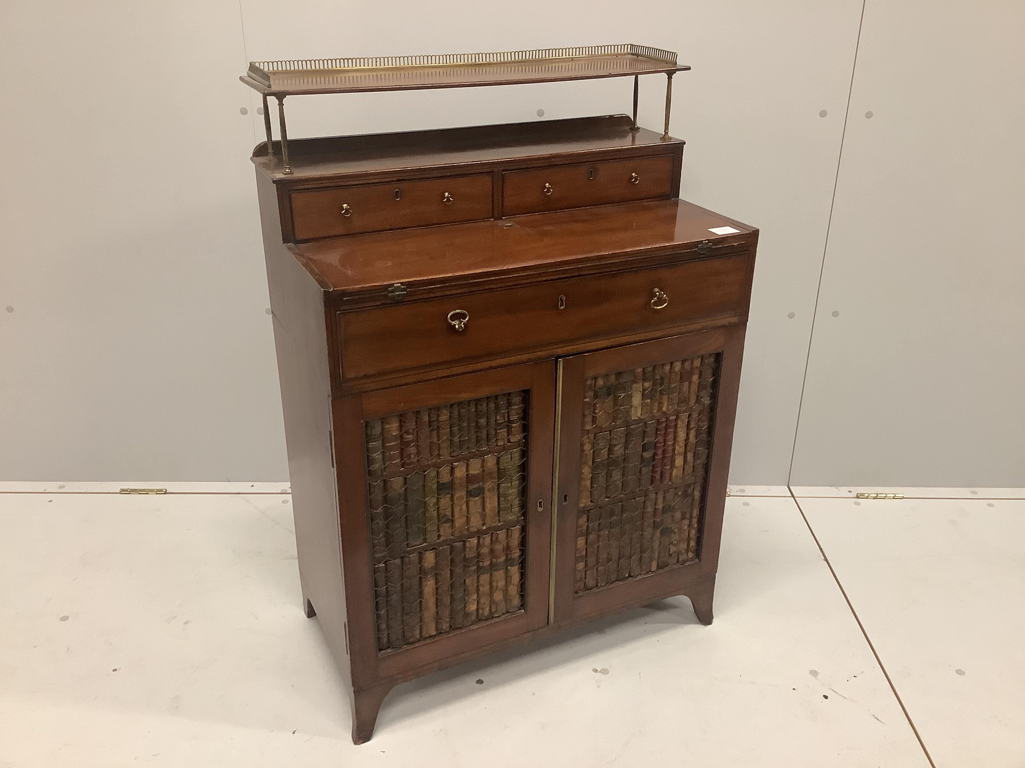 A Regency style mahogany chiffonier with folding writing surface, width 71cm, depth 40cm, height 104cm                                                                                                                      