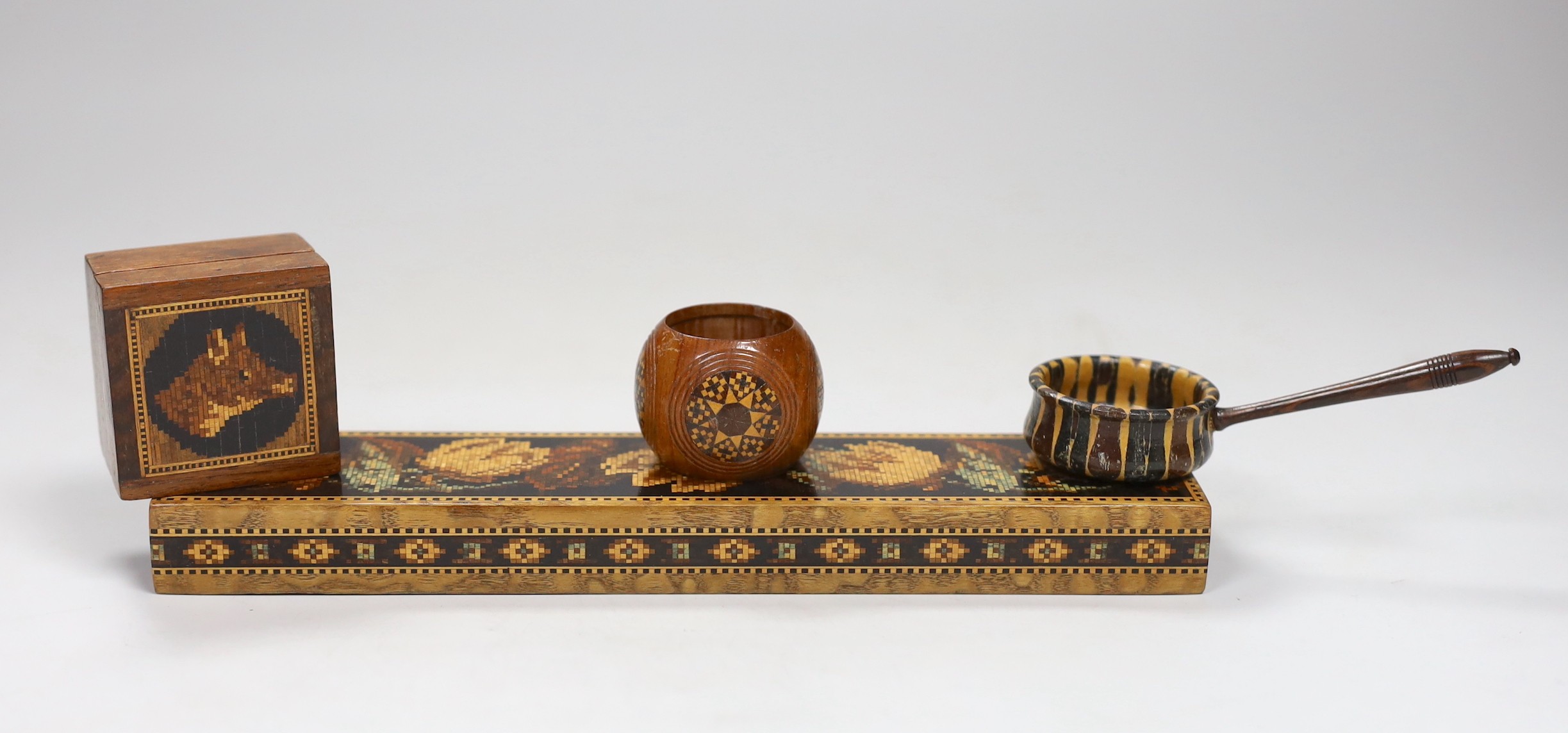 Tunbridgeware - a Hungarian ash case of lining paper samples, by Edmund Nye, possibly a travelling salesman’s sample set, 23.5cm, a stickware ladle, a napkin ring and a small box with rare portrait of a fox head         