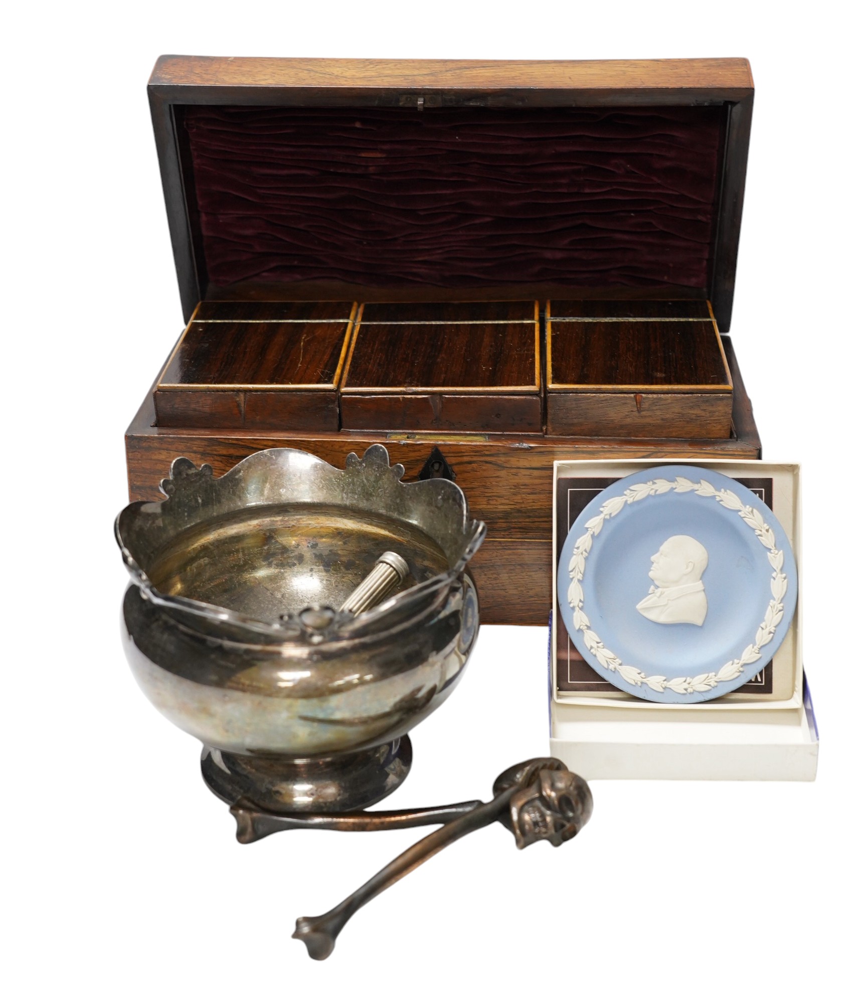 A Regency rosewood tea caddy, three pairs of nut crackers, one a novelty skull nut cracker, a plated bowl, two napkin rings and a Wedgwood dish                                                                             